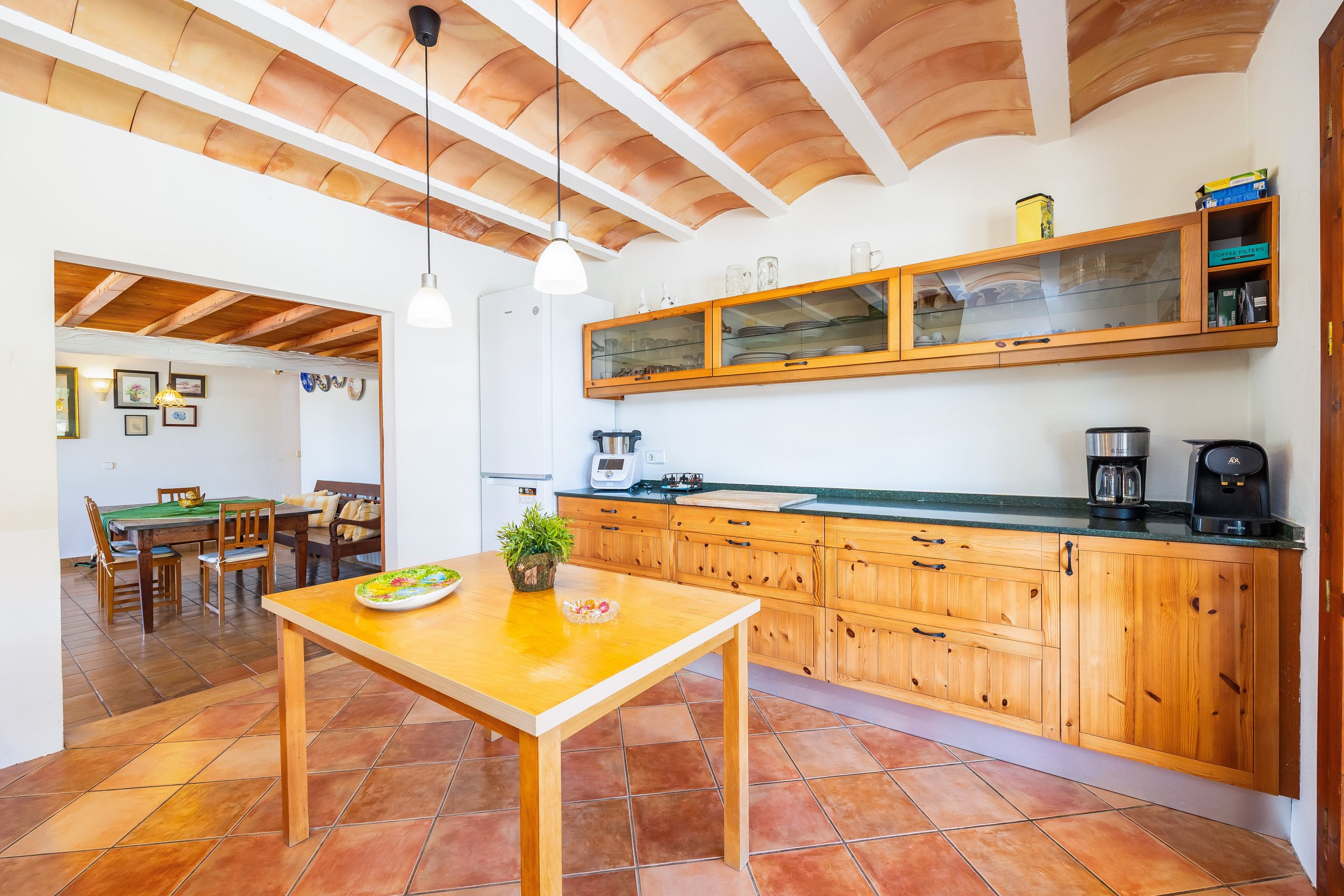 Rural house interior with natural light and traditional Mediterranean style real estate photography in Mallorca