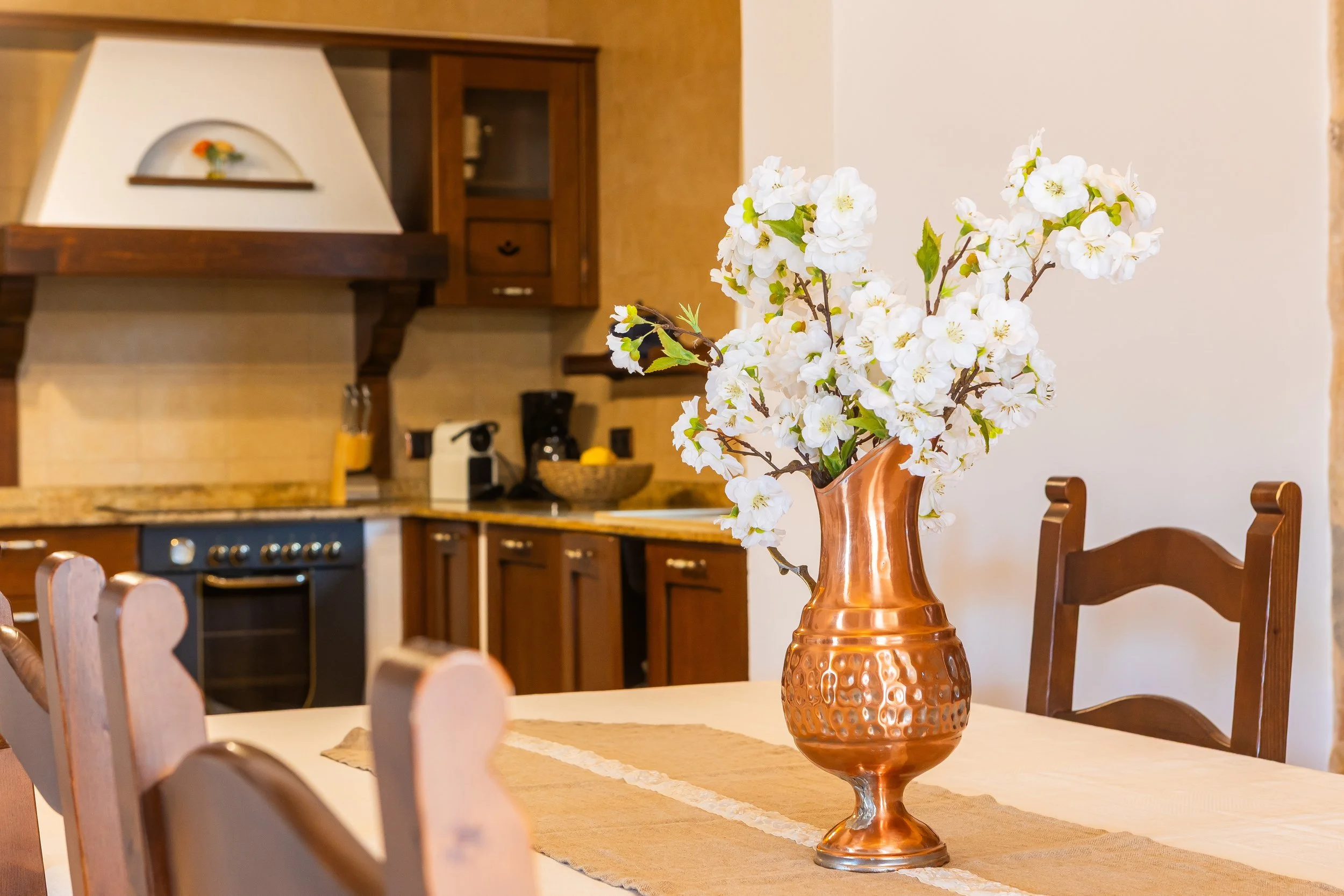 Traditional interior of Cas Cuni Mallorca with rustic architecture and natural light real estate photography