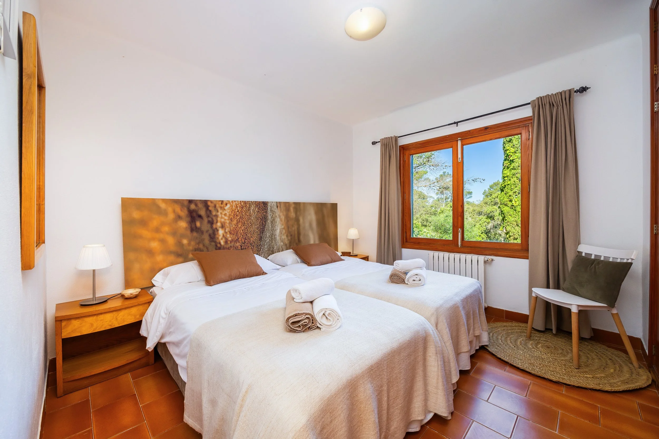 Traditional Mallorcan finca interior photography with natural light and rustic details