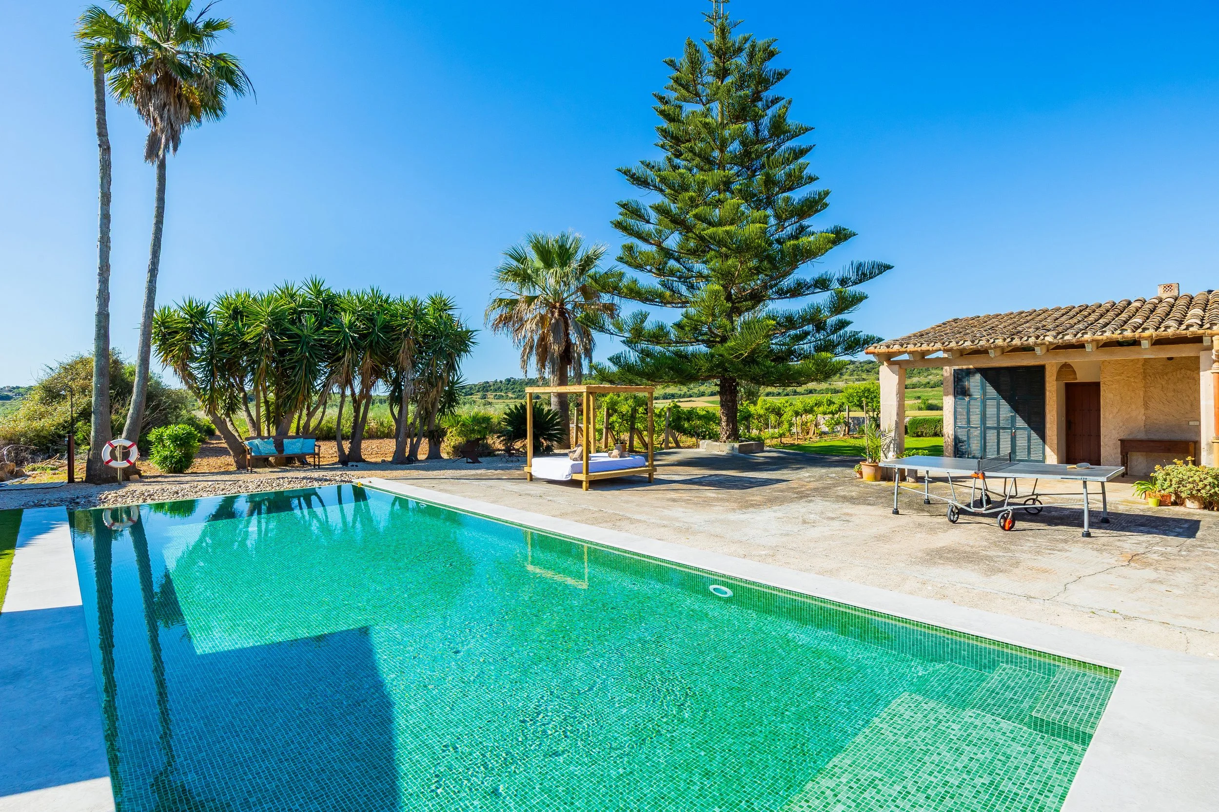 Rural house with swimming pool and open countryside views real estate photography in Mallorca