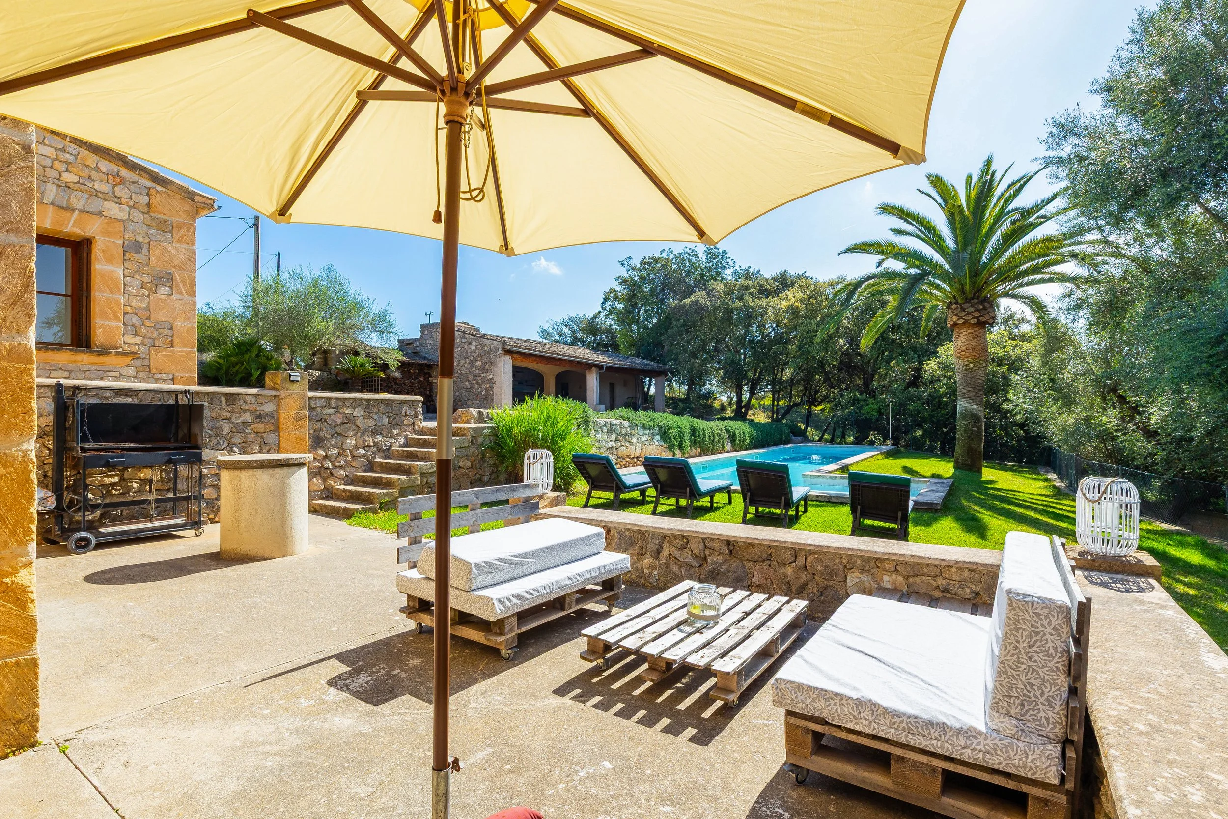 Traditional Mallorcan house with swimming pool near Artà surrounded by countryside real estate photography