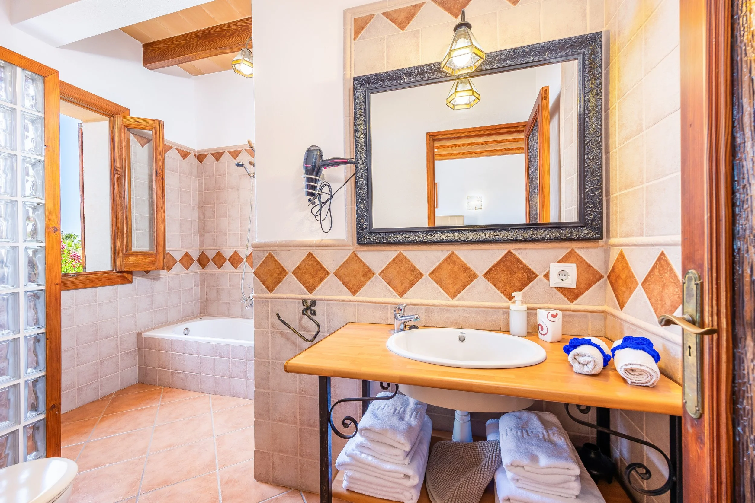 Traditional Mallorcan interior at Can Churi with rustic details and natural light real estate photography