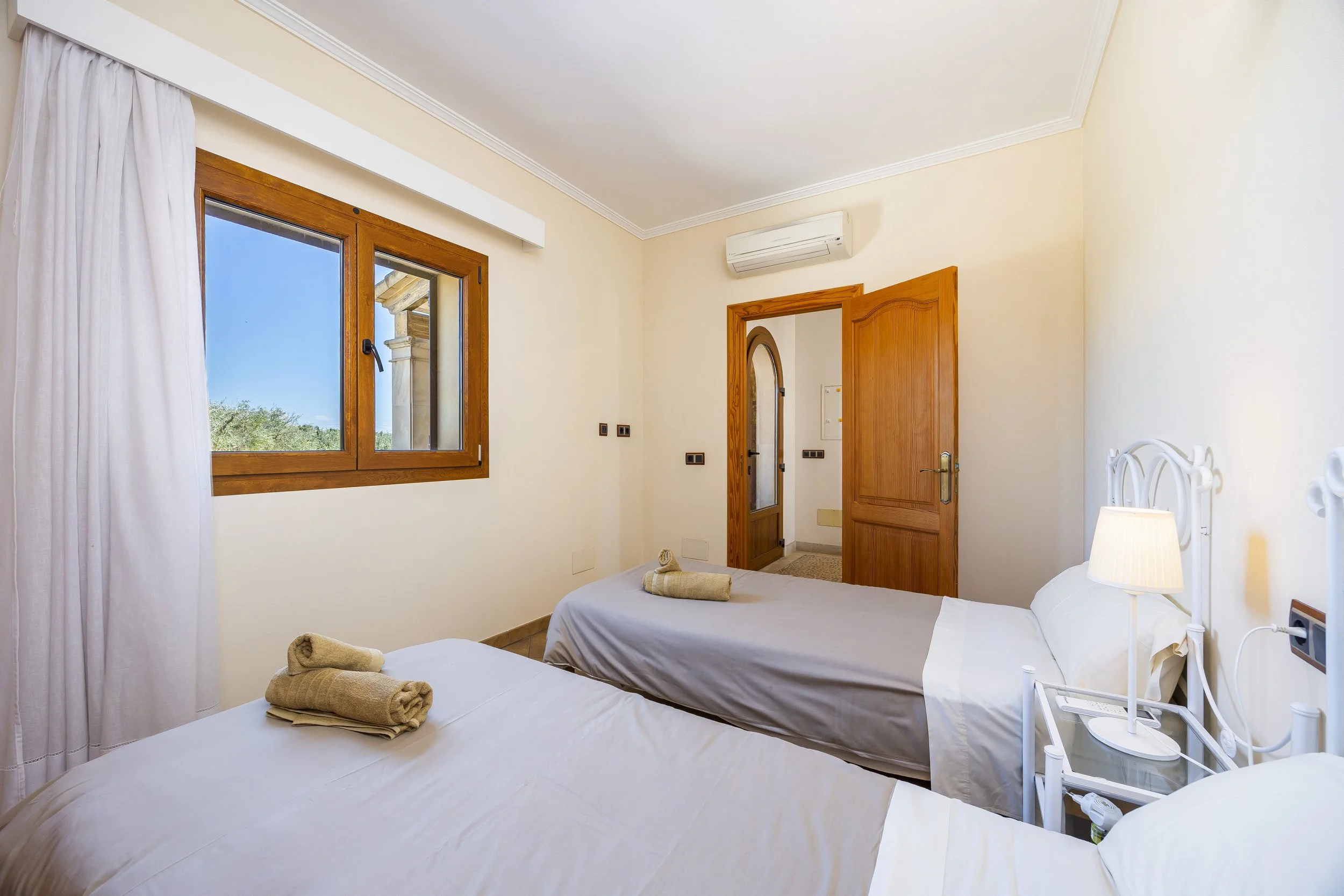 Rural house interior near Ses Salines Mallorca with natural light and traditional Mediterranean design real estate photography