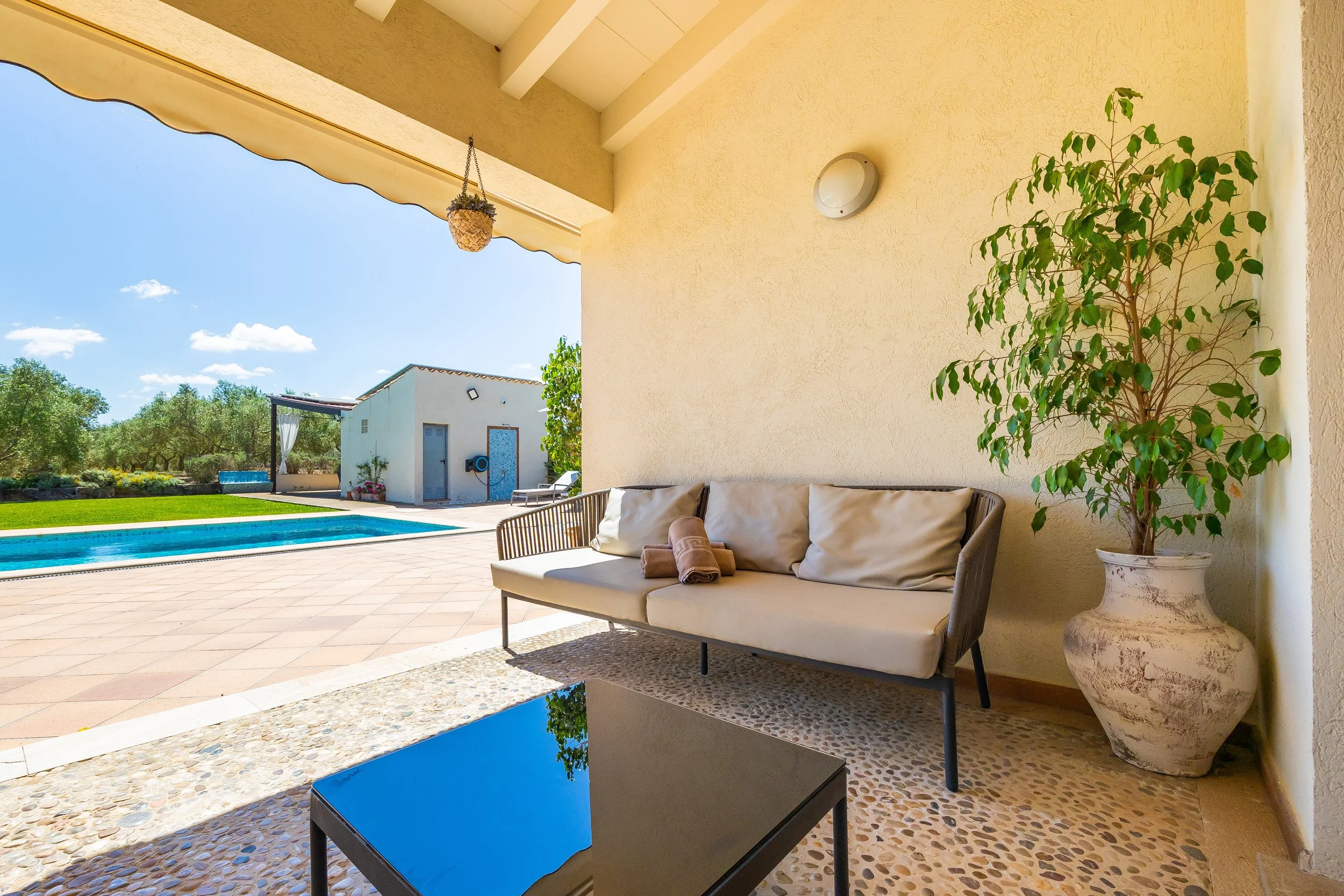 Sa Finca Mallorca finca exterior with pool, garden and family leisure area real estate photography