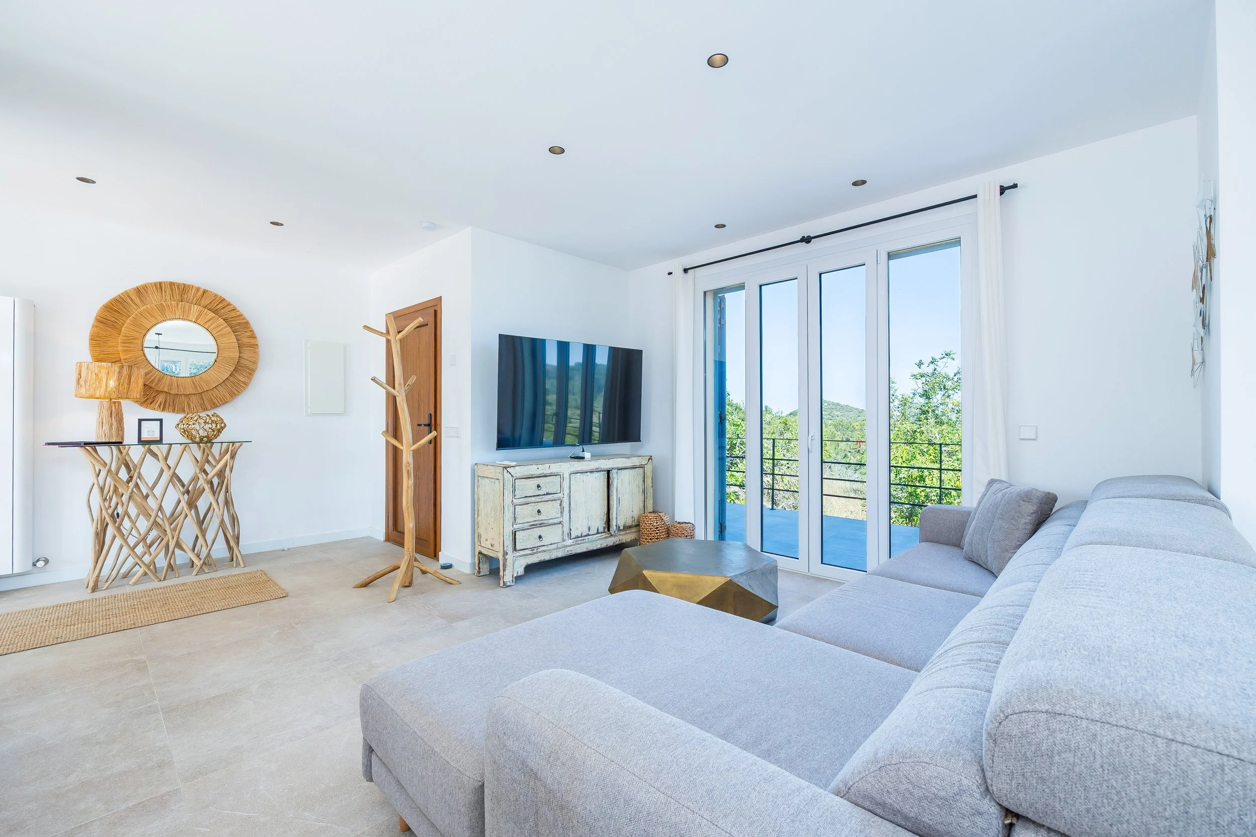 Can Gomez Mallorca renovated countryside interior with natural light and modern rustic style real estate photography