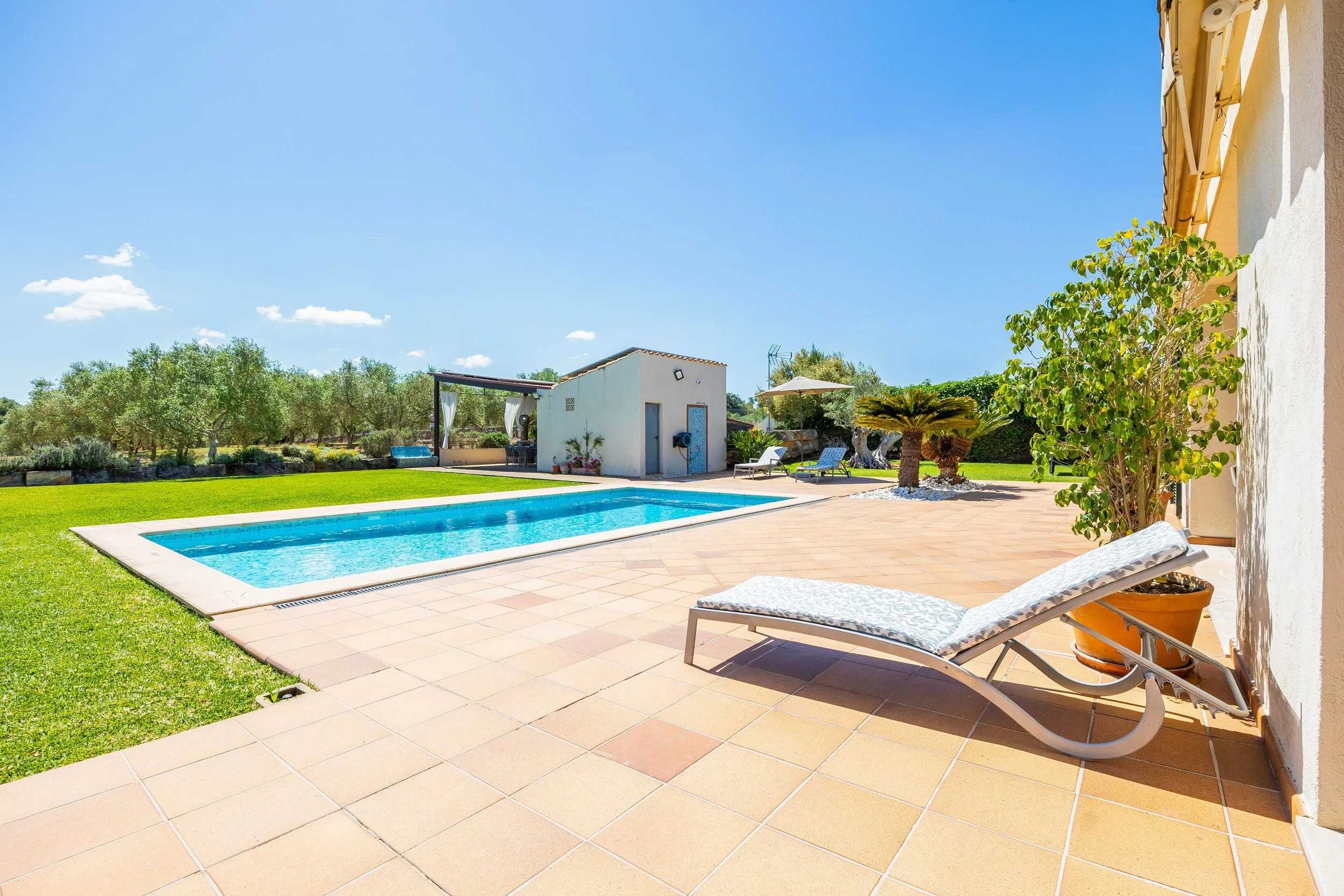 Sa Finca Mallorca finca exterior with pool, garden and family leisure area real estate photography