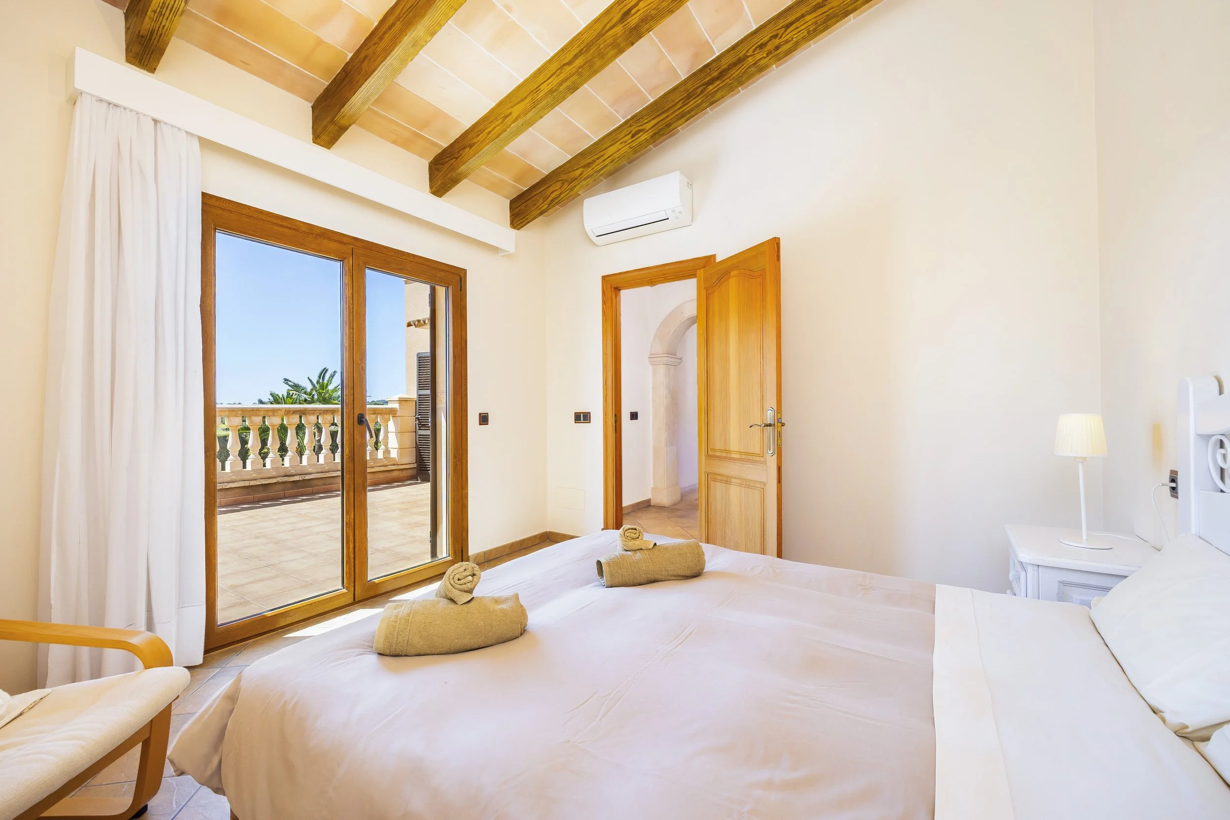 Rural house interior near Ses Salines Mallorca with natural light and traditional Mediterranean design real estate photography
