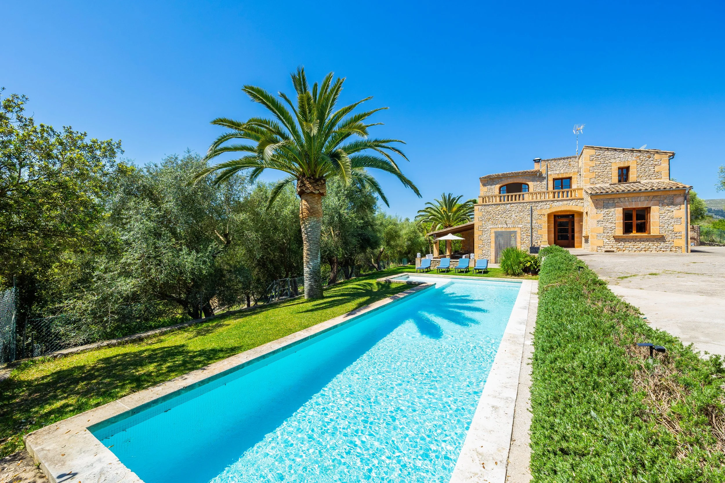 Traditional Mallorcan house with swimming pool near Artà surrounded by countryside real estate photography