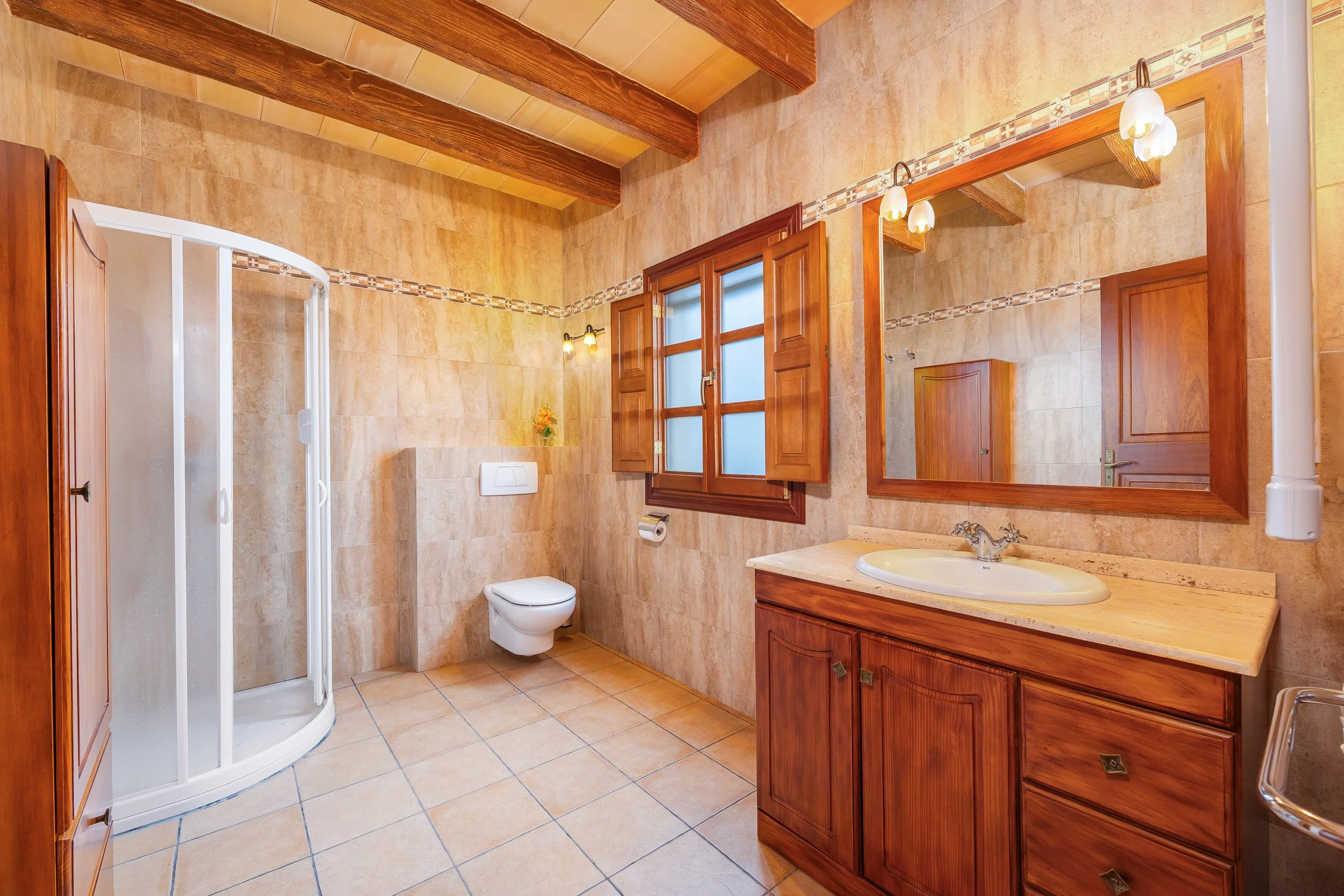 Traditional interior of Cas Cuni Mallorca with rustic architecture and natural light real estate photography