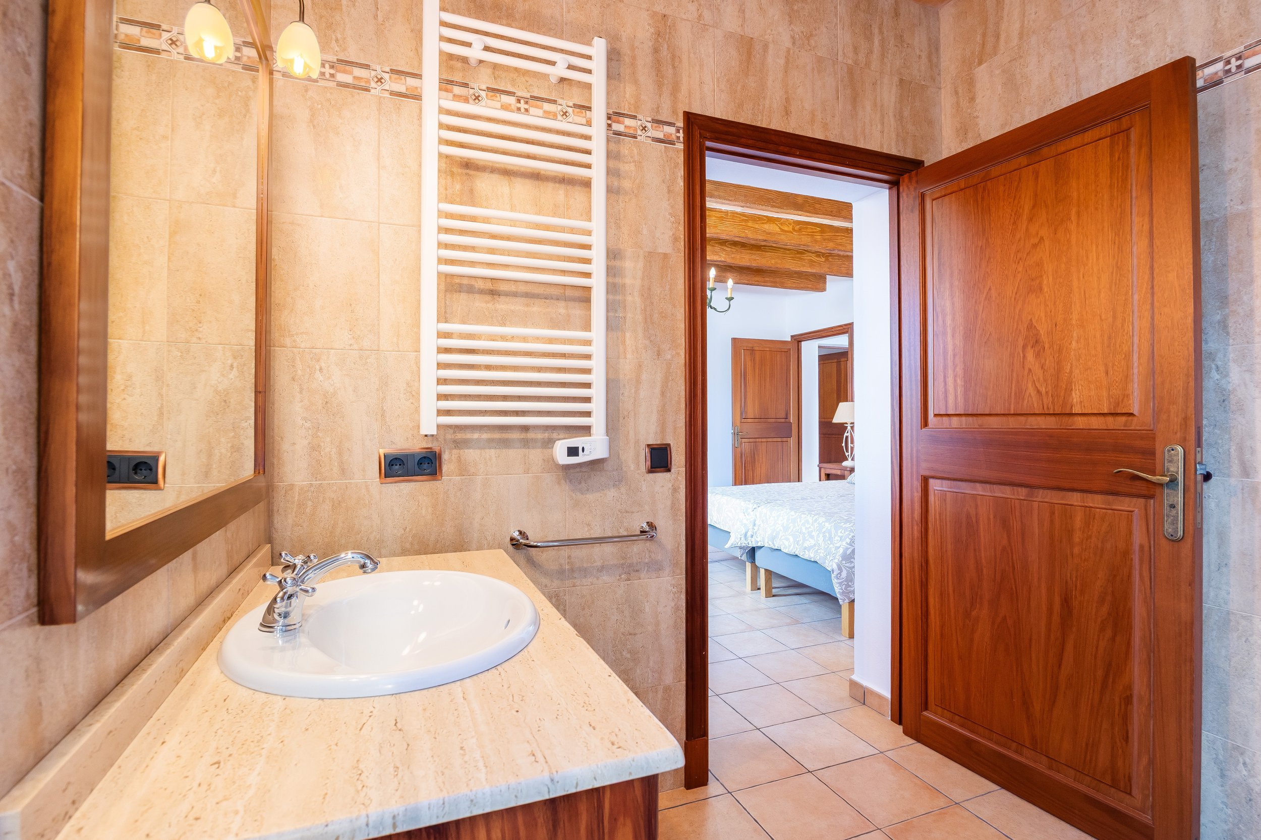 Traditional interior of Cas Cuni Mallorca with rustic architecture and natural light real estate photography