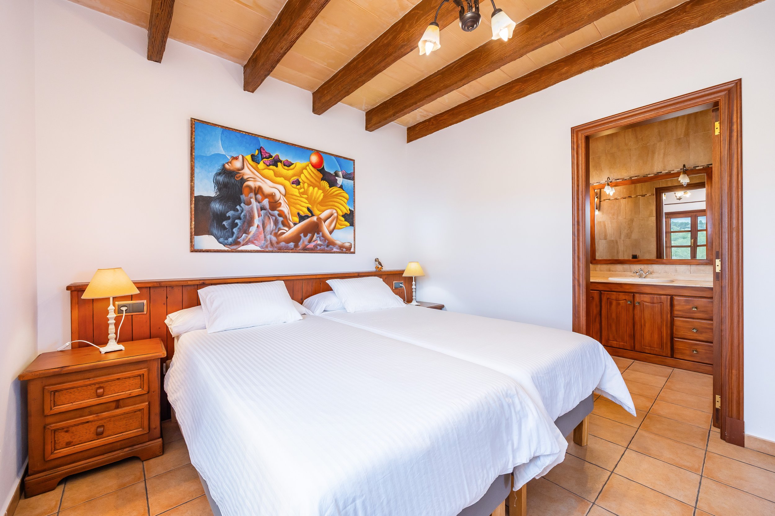 Traditional interior of Cas Cuni Mallorca with rustic architecture and natural light real estate photography