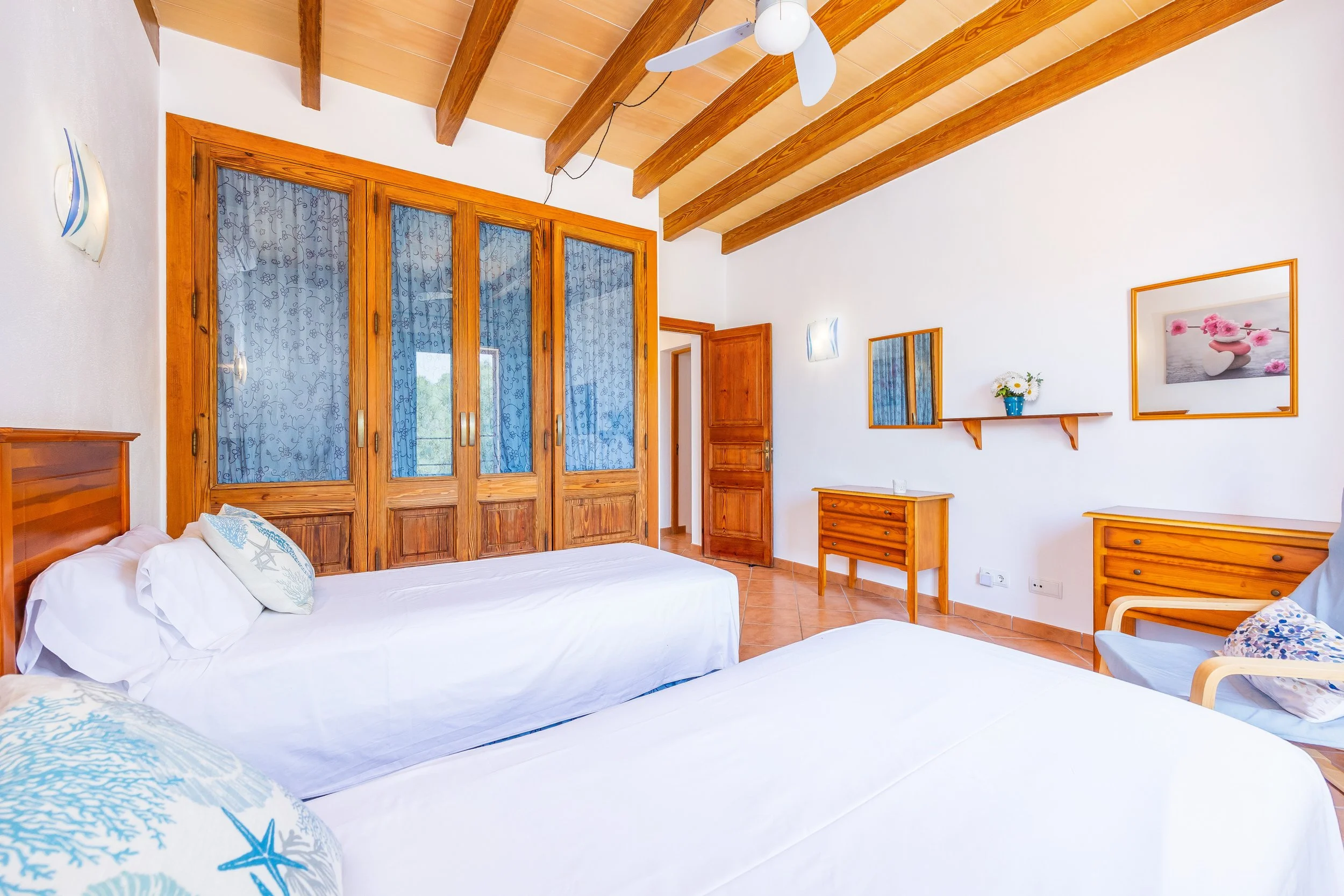 Traditional Mallorcan interior at Can Churi with rustic details and natural light real estate photography
