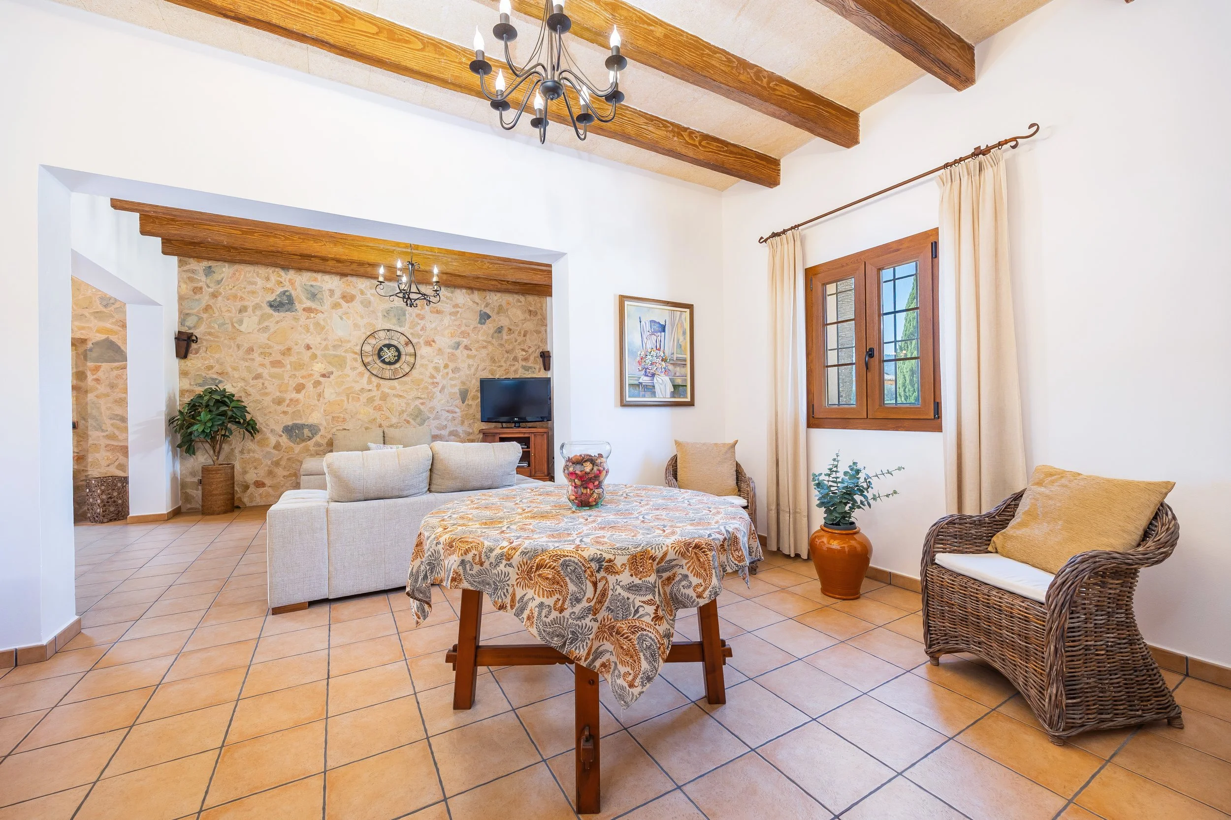 Traditional interior of Cas Cuni Mallorca with rustic architecture and natural light real estate photography