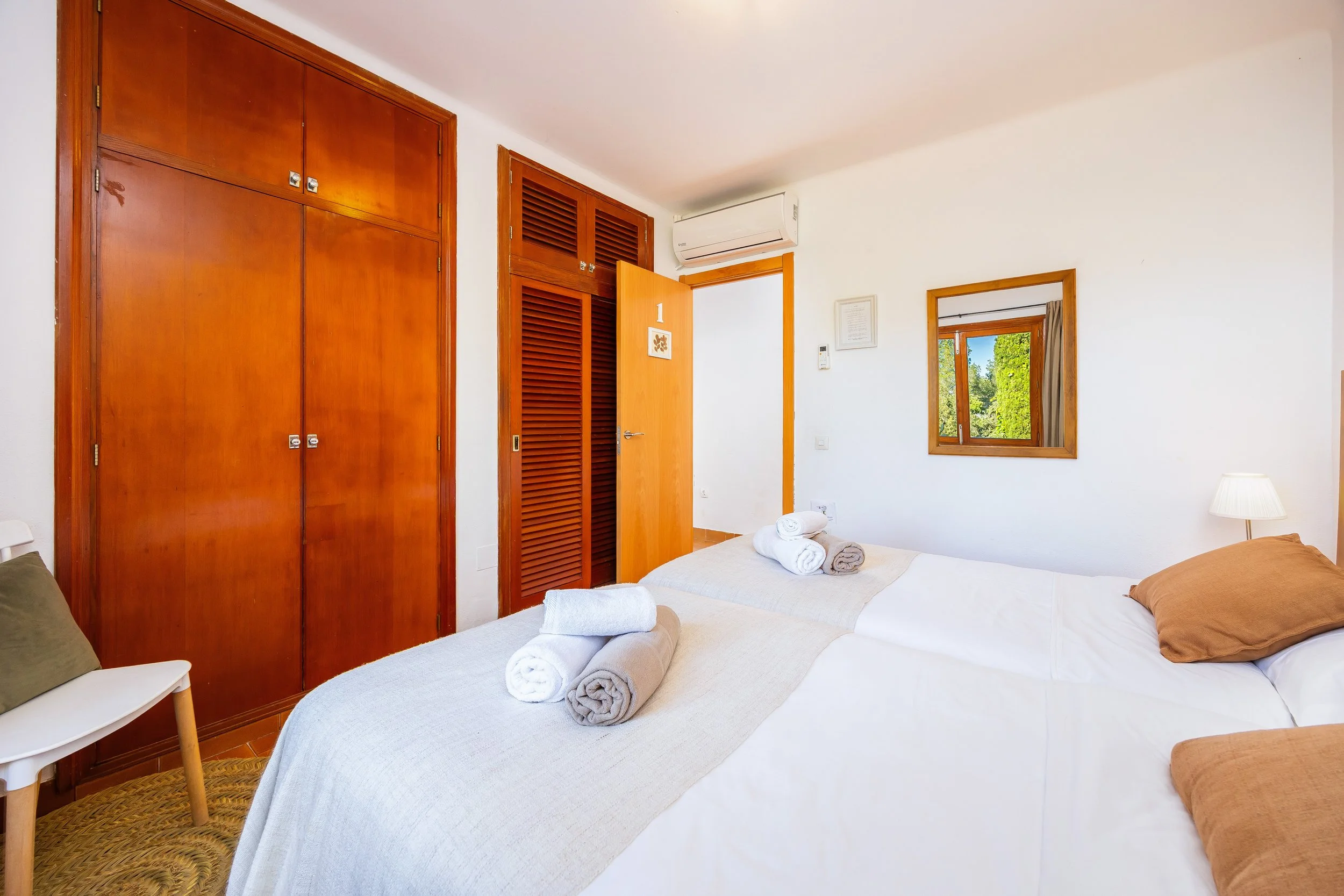 Traditional Mallorcan finca interior photography with natural light and rustic details
