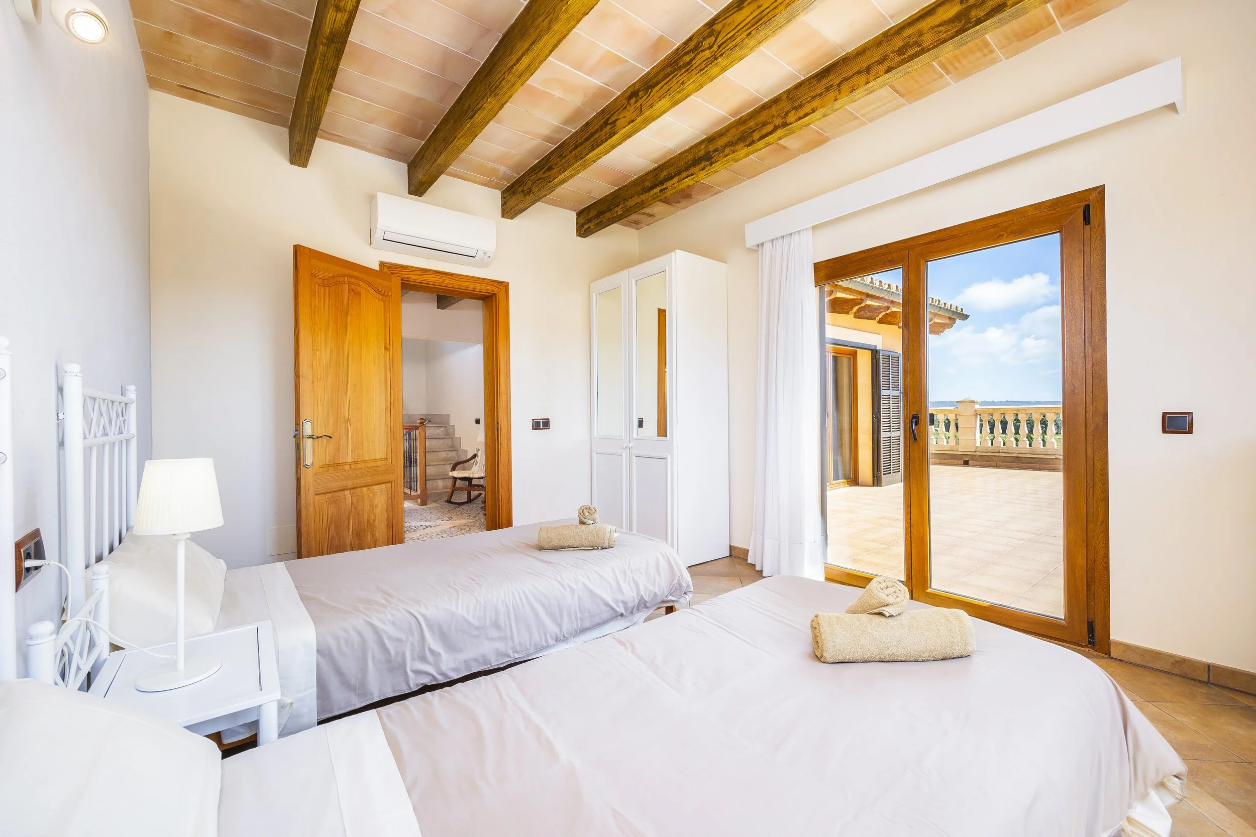 Rural house interior near Ses Salines Mallorca with natural light and traditional Mediterranean design real estate photography