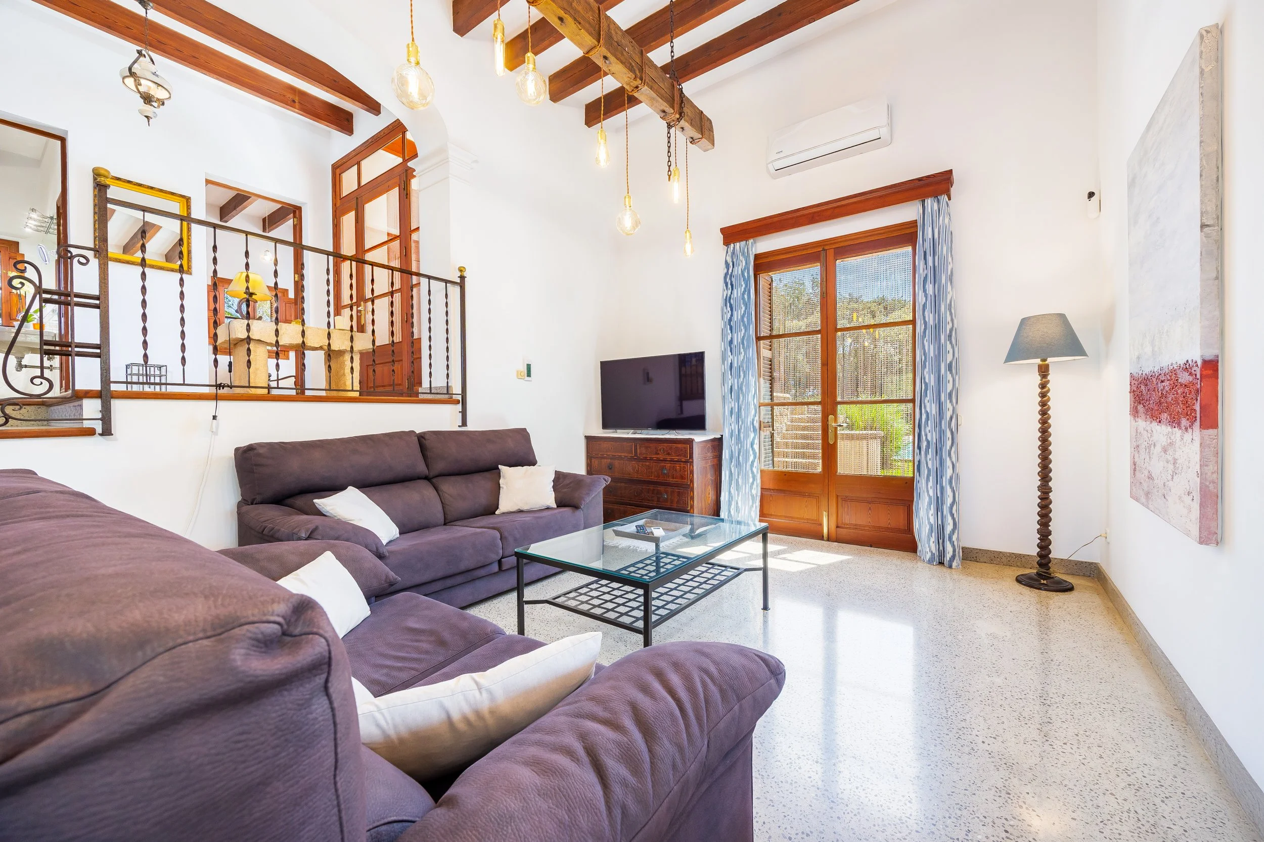 Mallorcan house interior near Artà with rustic architecture and natural light real estate photography