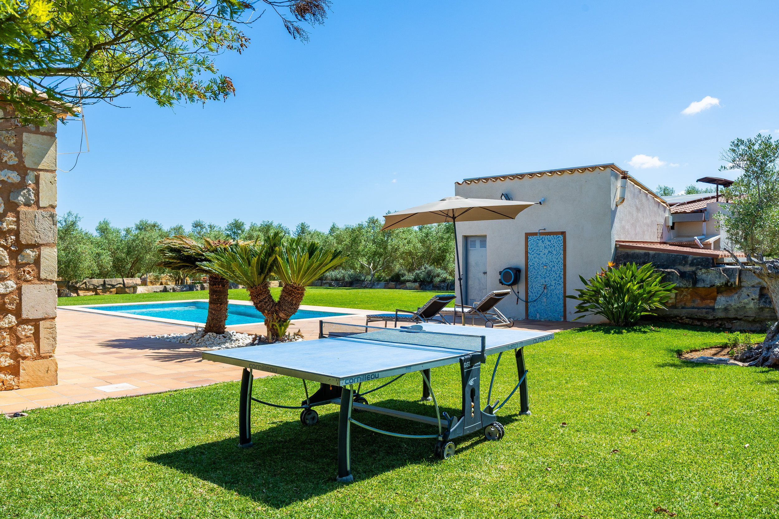 Sa Finca Mallorca finca exterior with pool, garden and family leisure area real estate photography