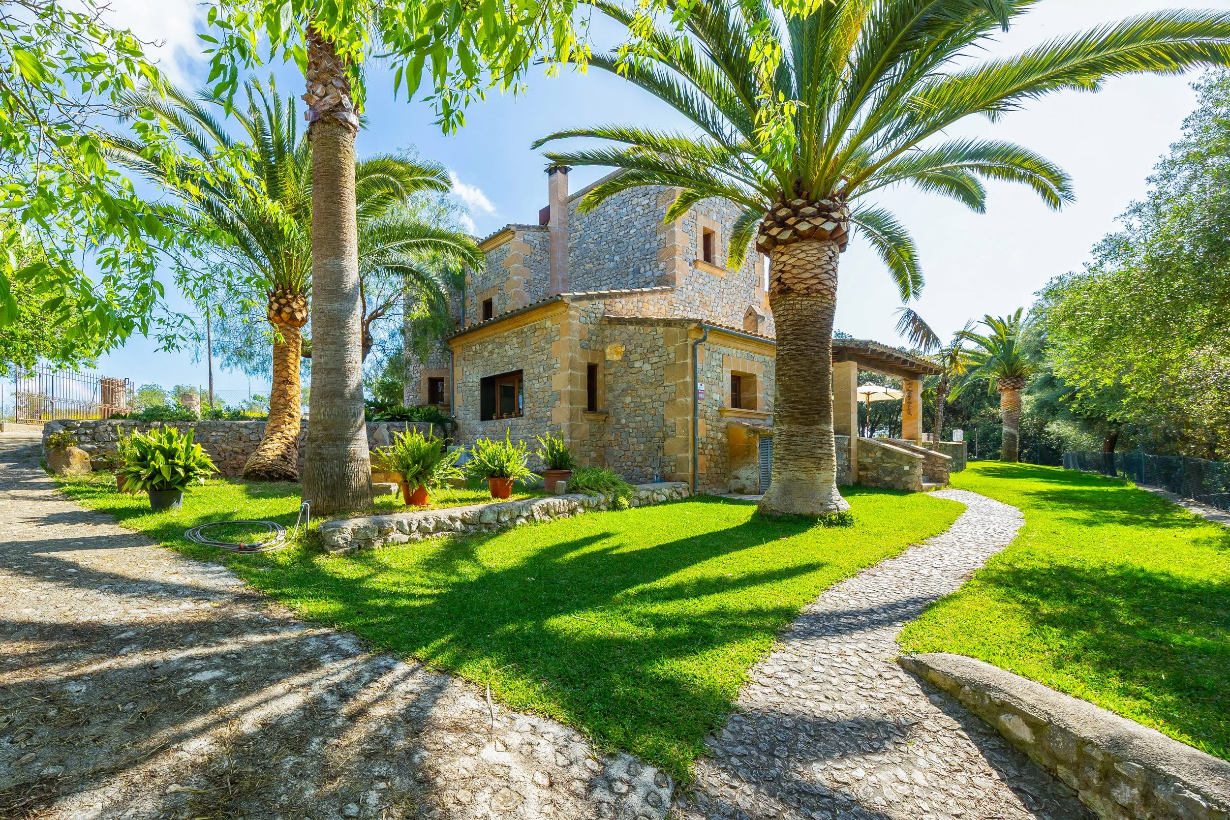 Traditional Mallorcan house with swimming pool near Artà surrounded by countryside real estate photography