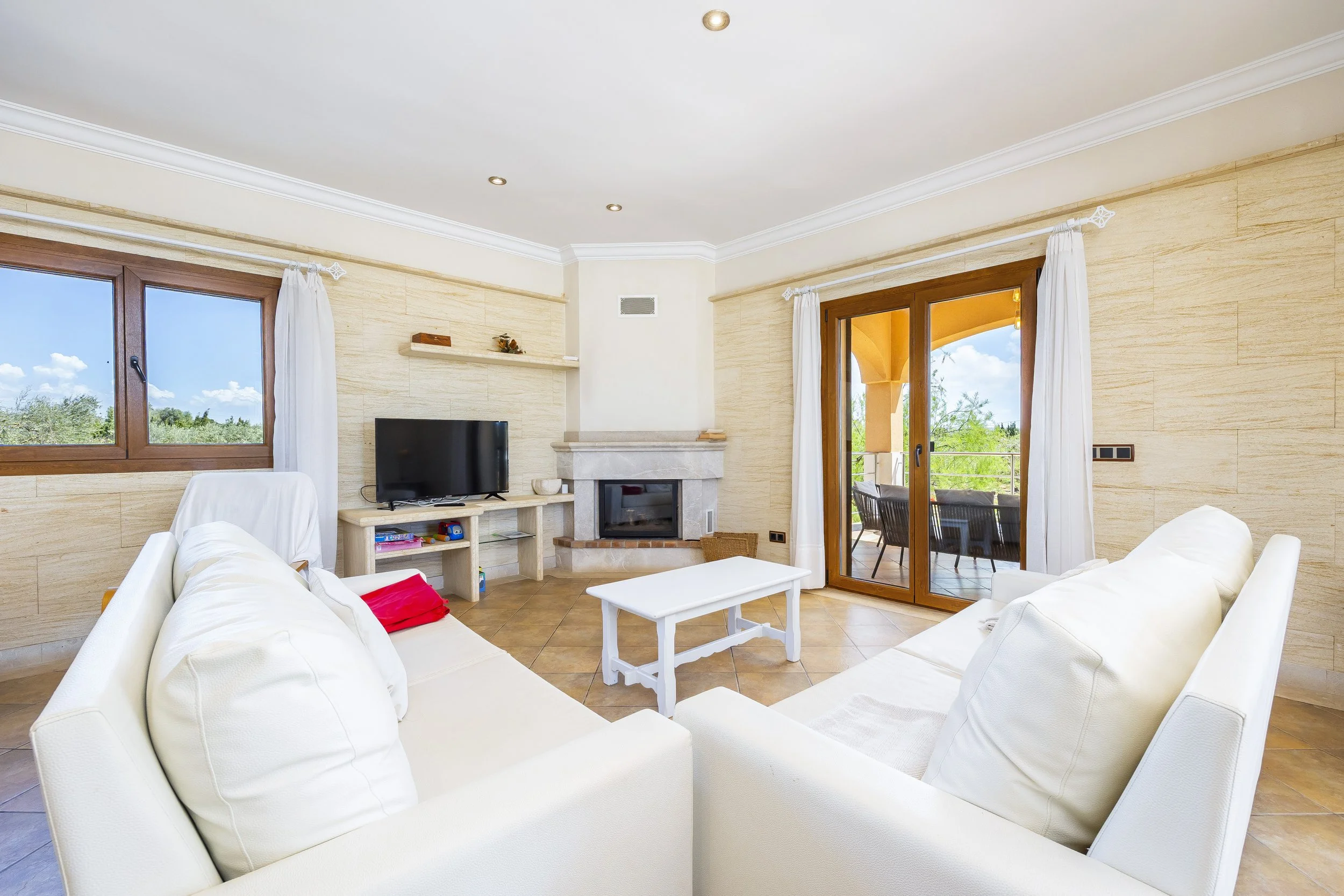 Rural house interior near Ses Salines Mallorca with natural light and traditional Mediterranean design real estate photography