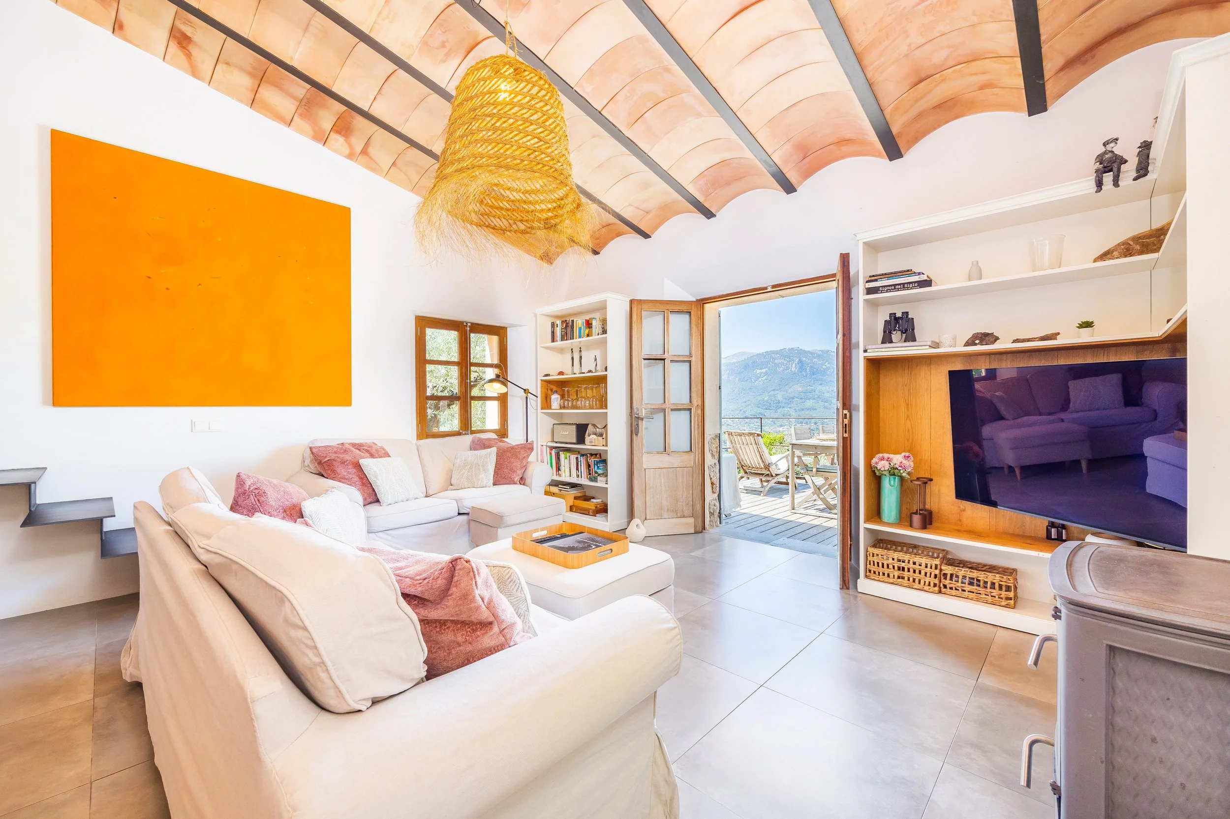 Mountain house interior near Sóller Mallorca renovated with natural light and modern rustic style real estate photography