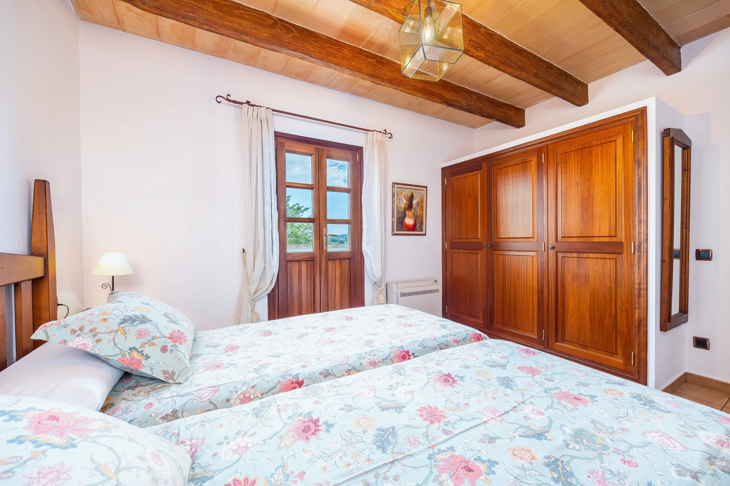 Traditional interior of Cas Cuni Mallorca with rustic architecture and natural light real estate photography
