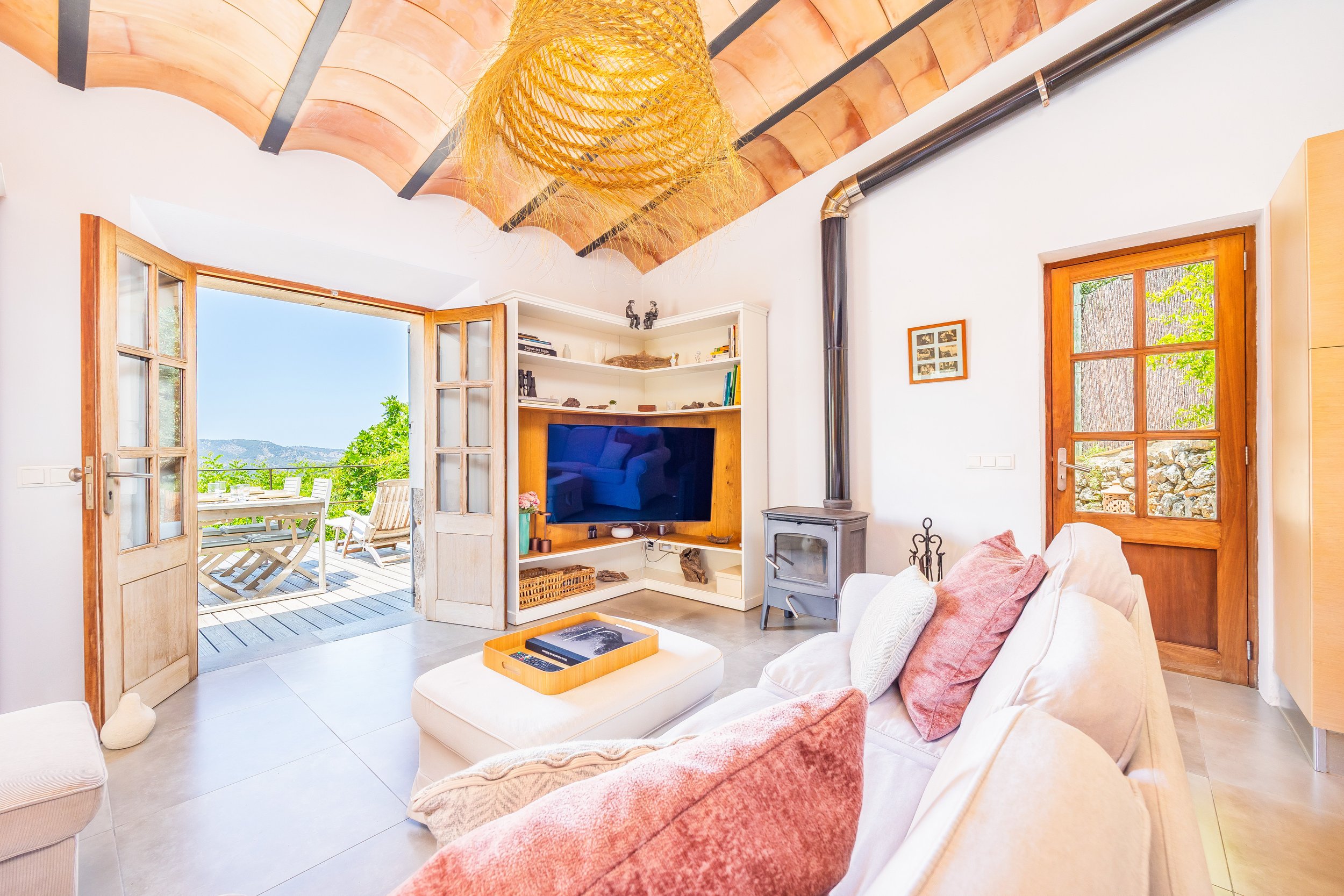 Mountain house interior near Sóller Mallorca renovated with natural light and modern rustic style real estate photography
