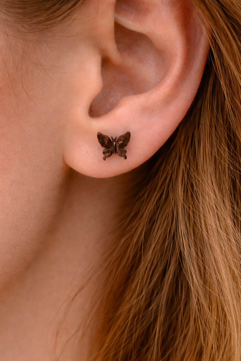 Delicate butterfly coconut shell earring.png