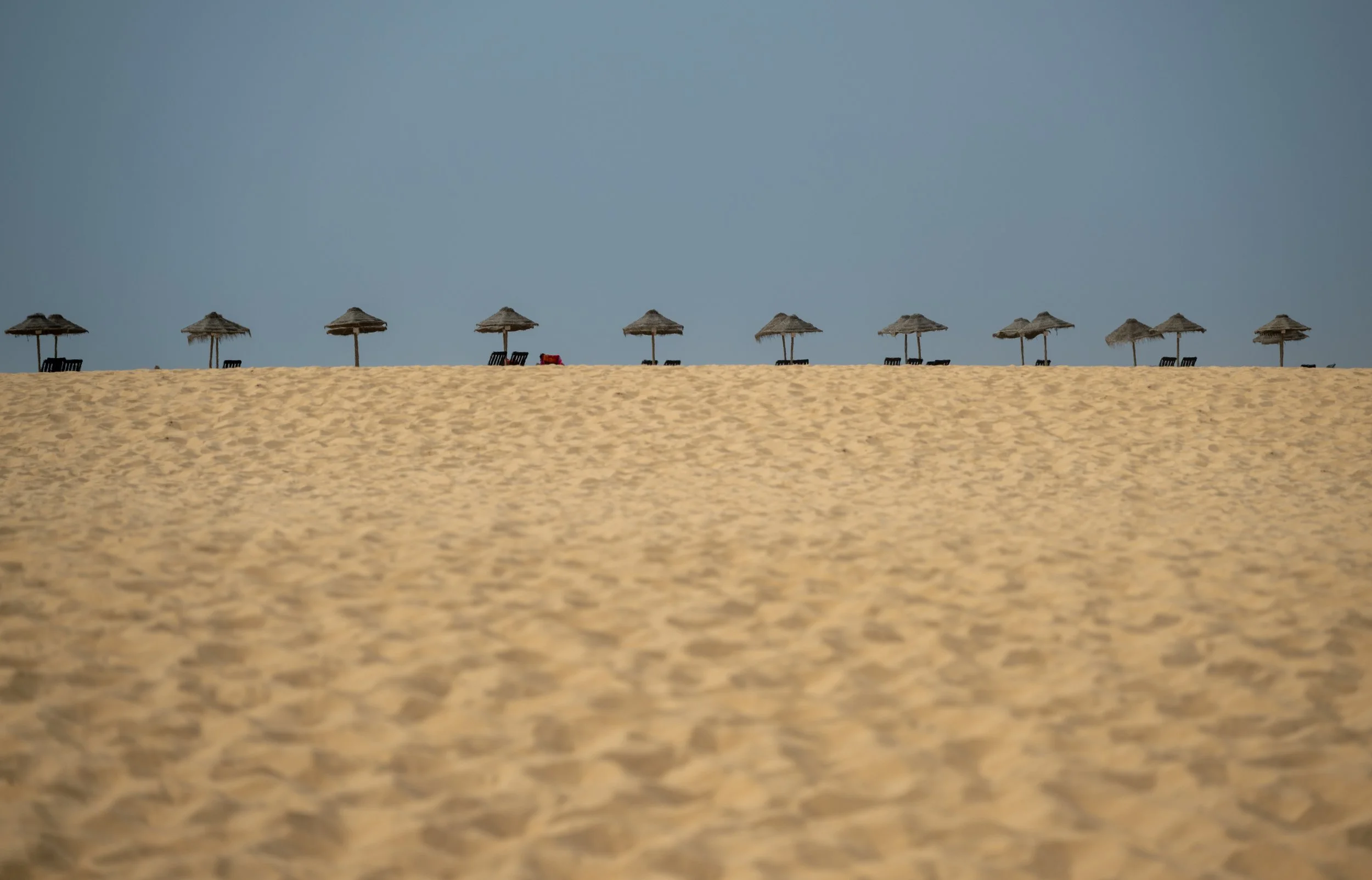 Beach umbrella's at the Algarve coast in Portugal