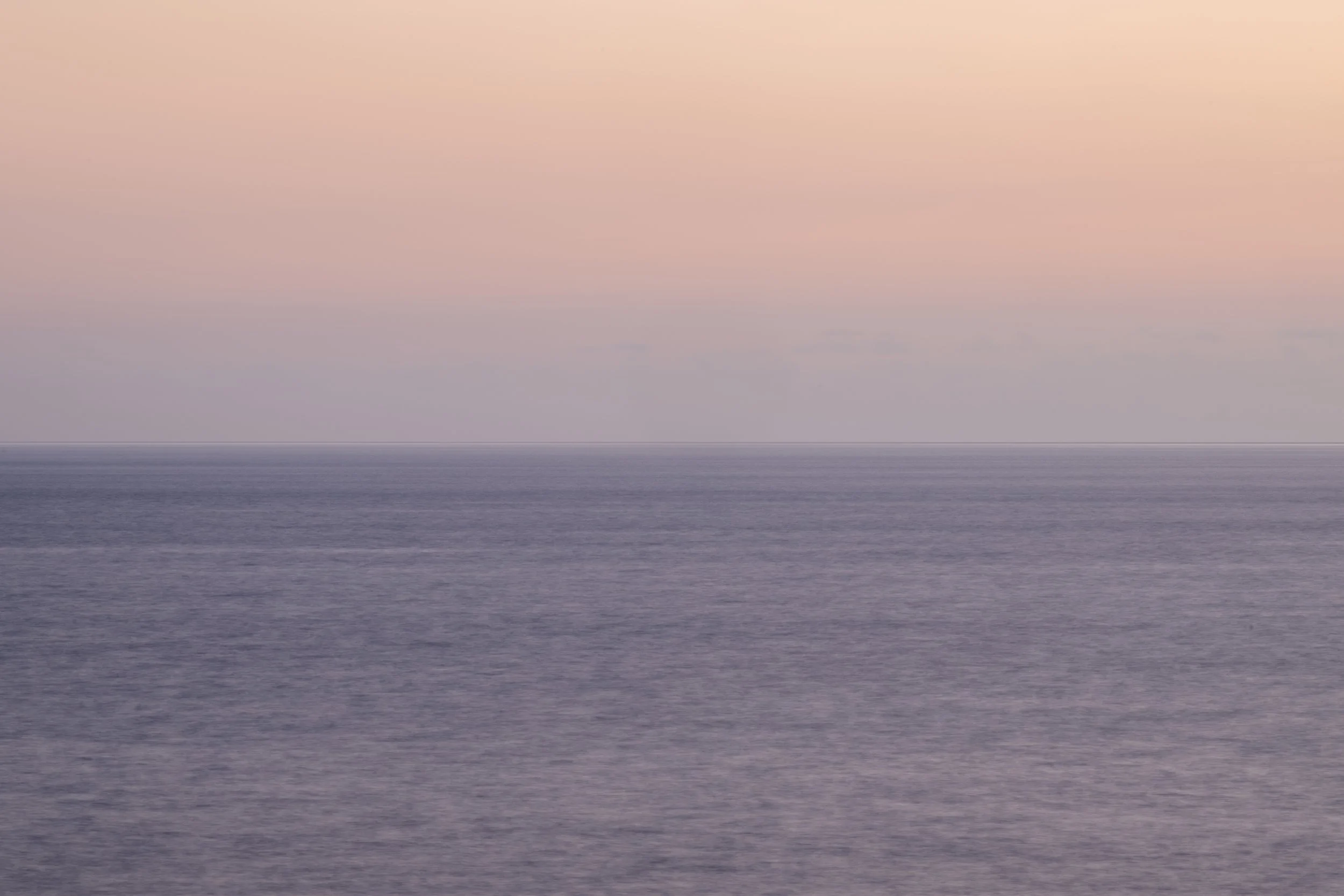 Atlantic Ocean shot, bottom acean and top sky. Going purple