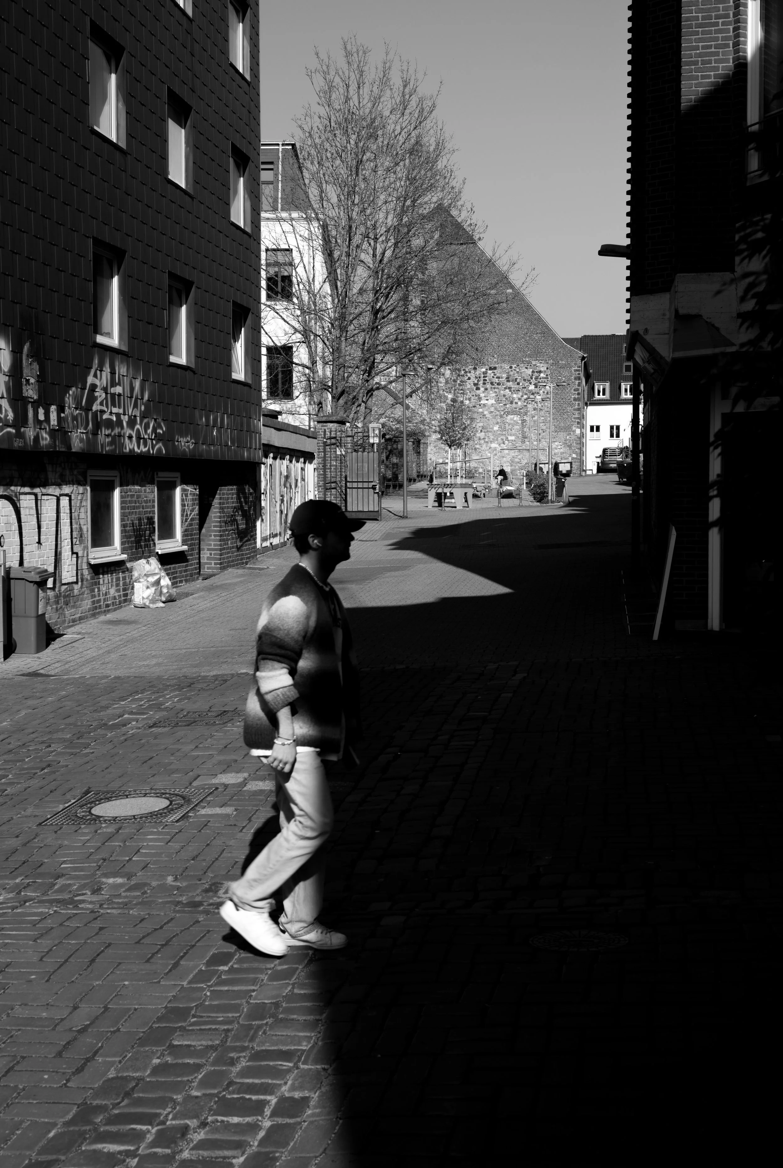 In to the shadow from out of the light.