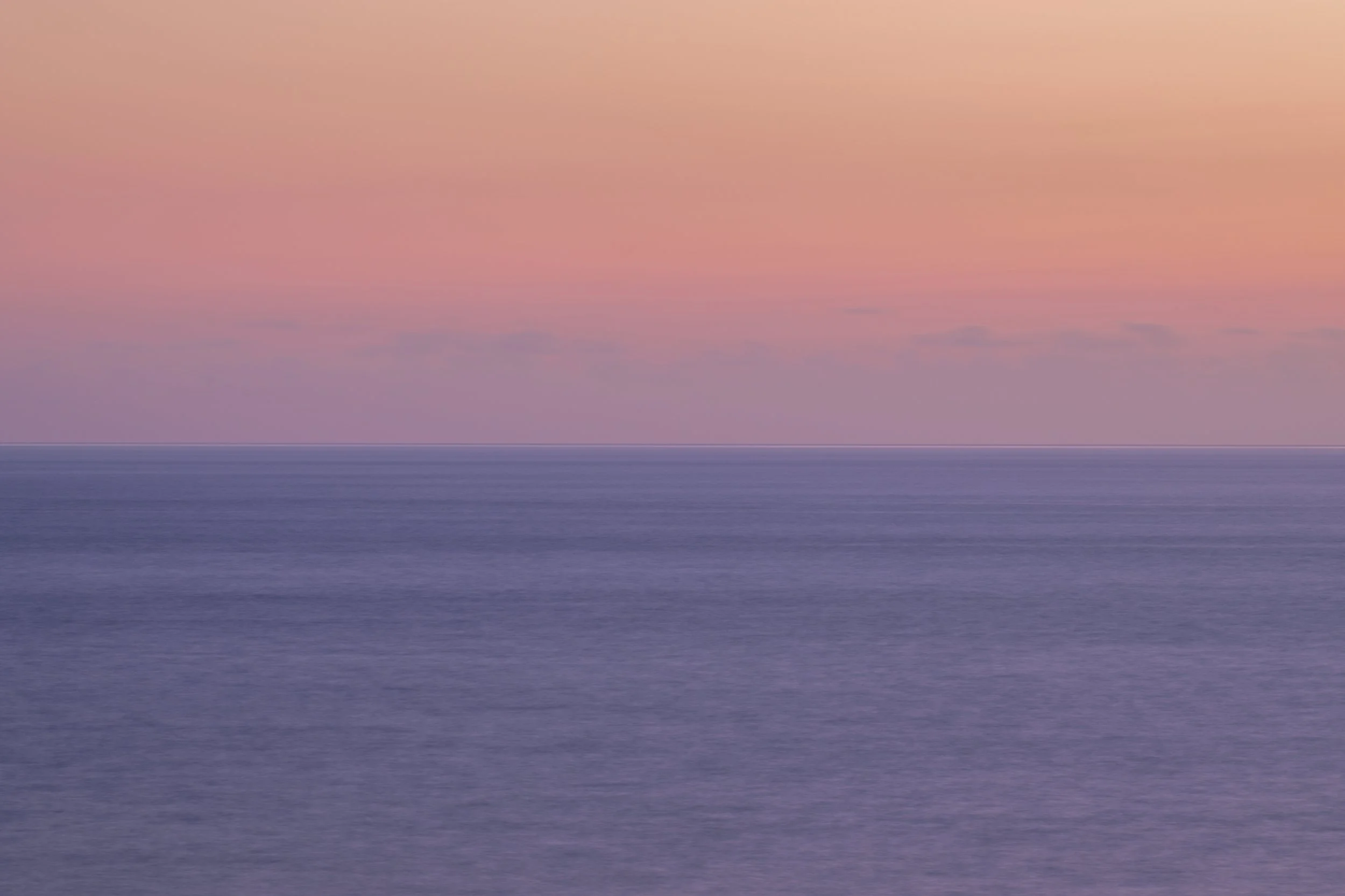 Atlantic Ocean shot, bottom acean and top sky. Purple at last