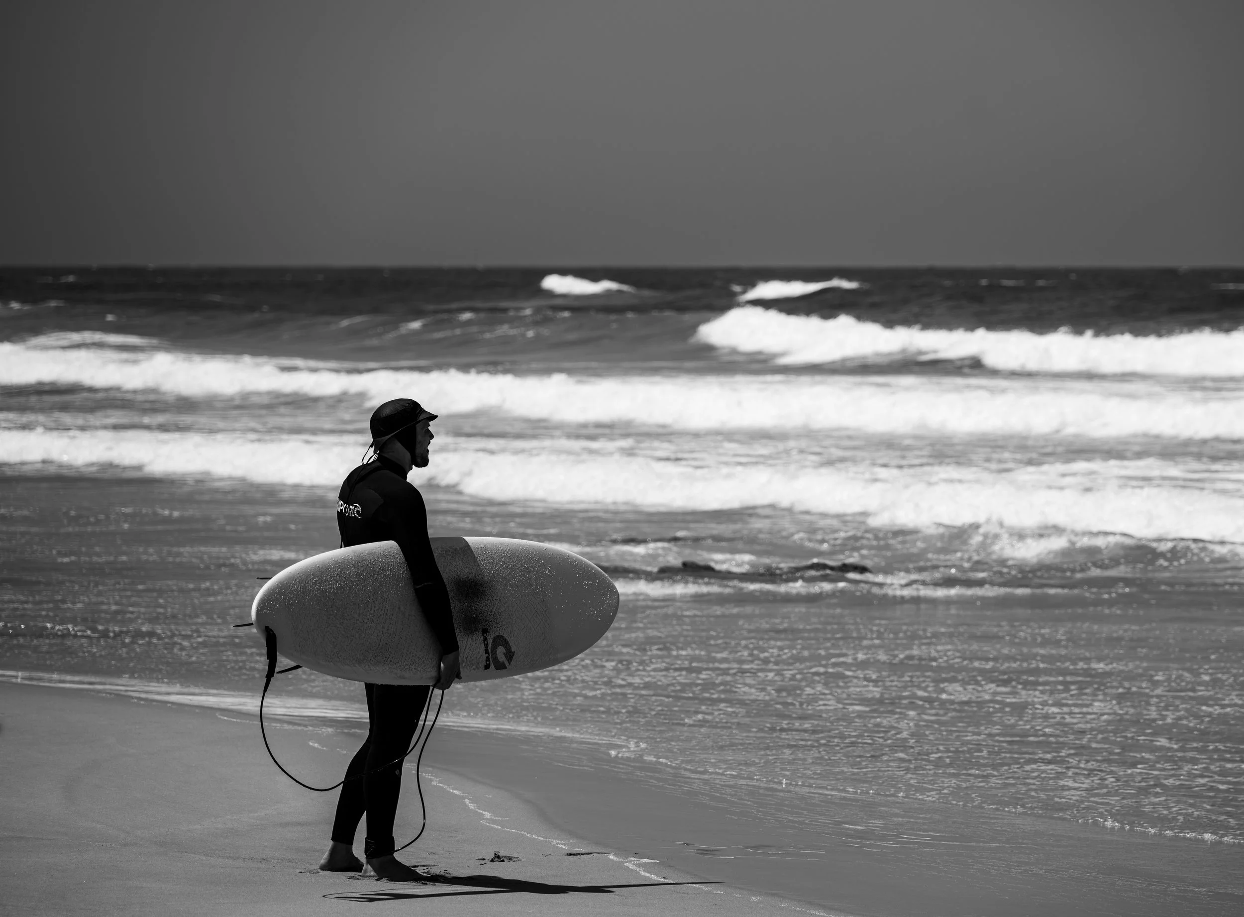 Surfer waiting for a good ride.