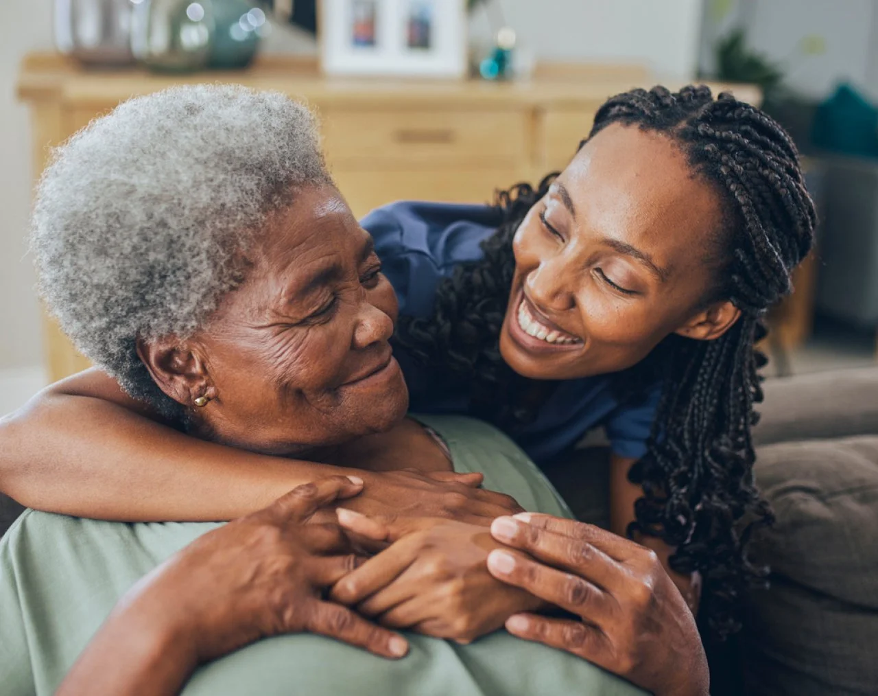 Image of a patient and nurse, representing improved access and outcomes through rural health transformation.