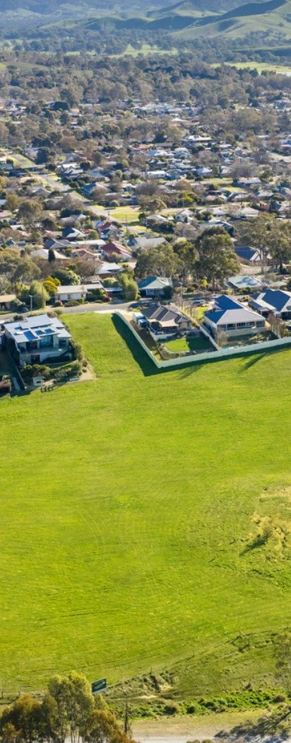 Woodlands Grove site beside established homes on the edge of Alexandra township