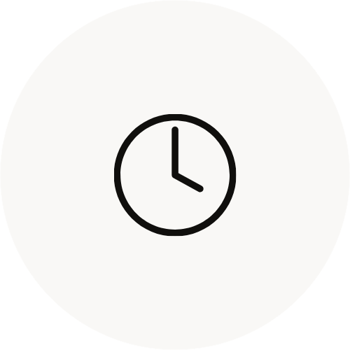 A simple black clock icon showing the time as 3 o'clock on a gray background.