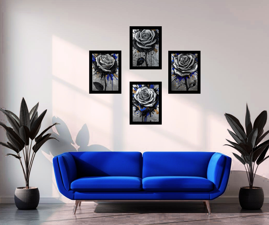 Interior living room with a bright blue sofa, black framed artwork of grey roses with splashes of blue and black on the wall, and two large potted plants on either side of the sofa.
