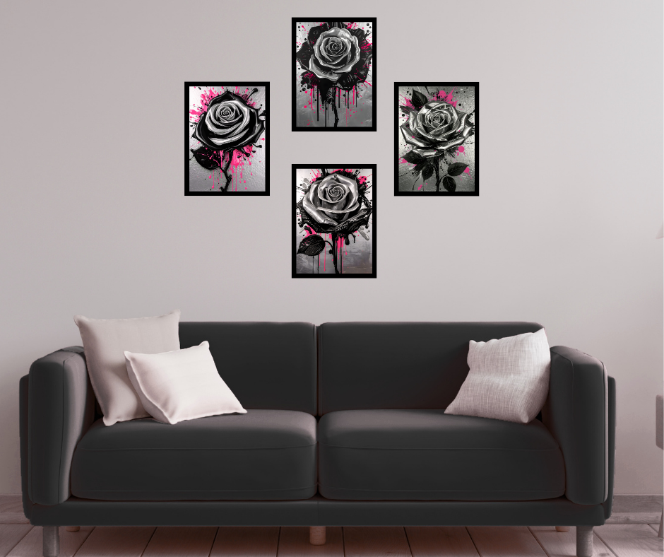 A black sofa with four white cushions in front of a white wall featuring a four-panel artwork of black and white roses with pink and black paint splatters.