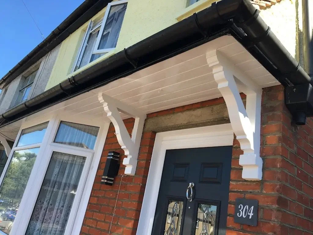 Restored front door with a high-quality painted exterior finish.
