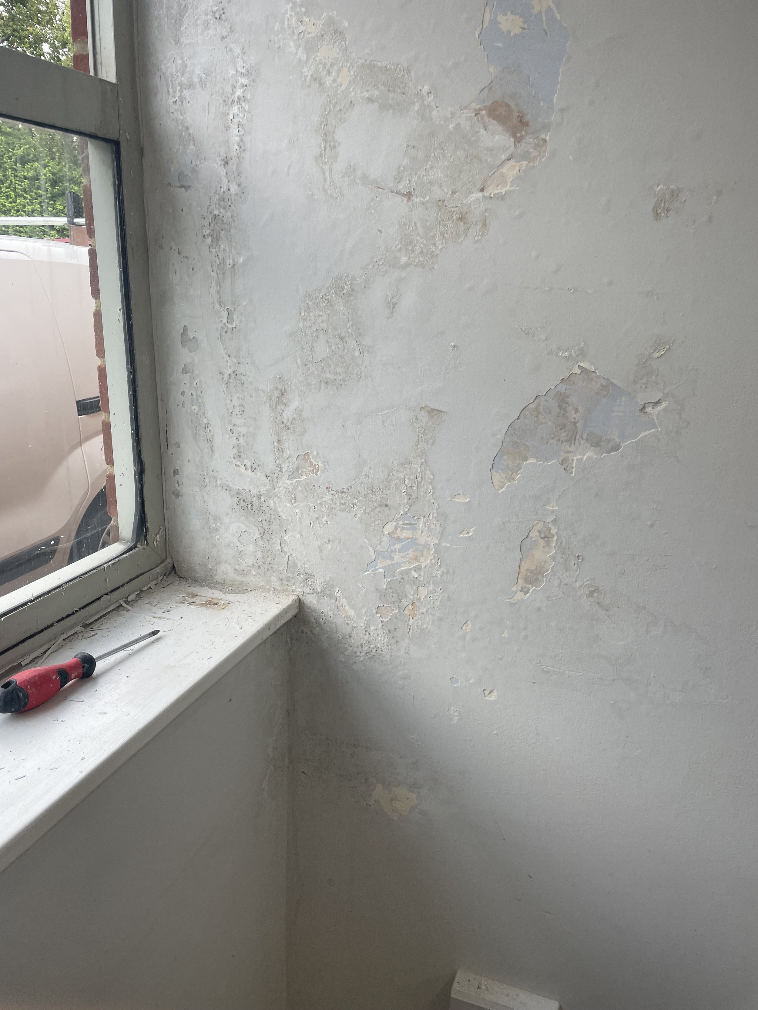 Residential Interior before walls were restored and redecorated