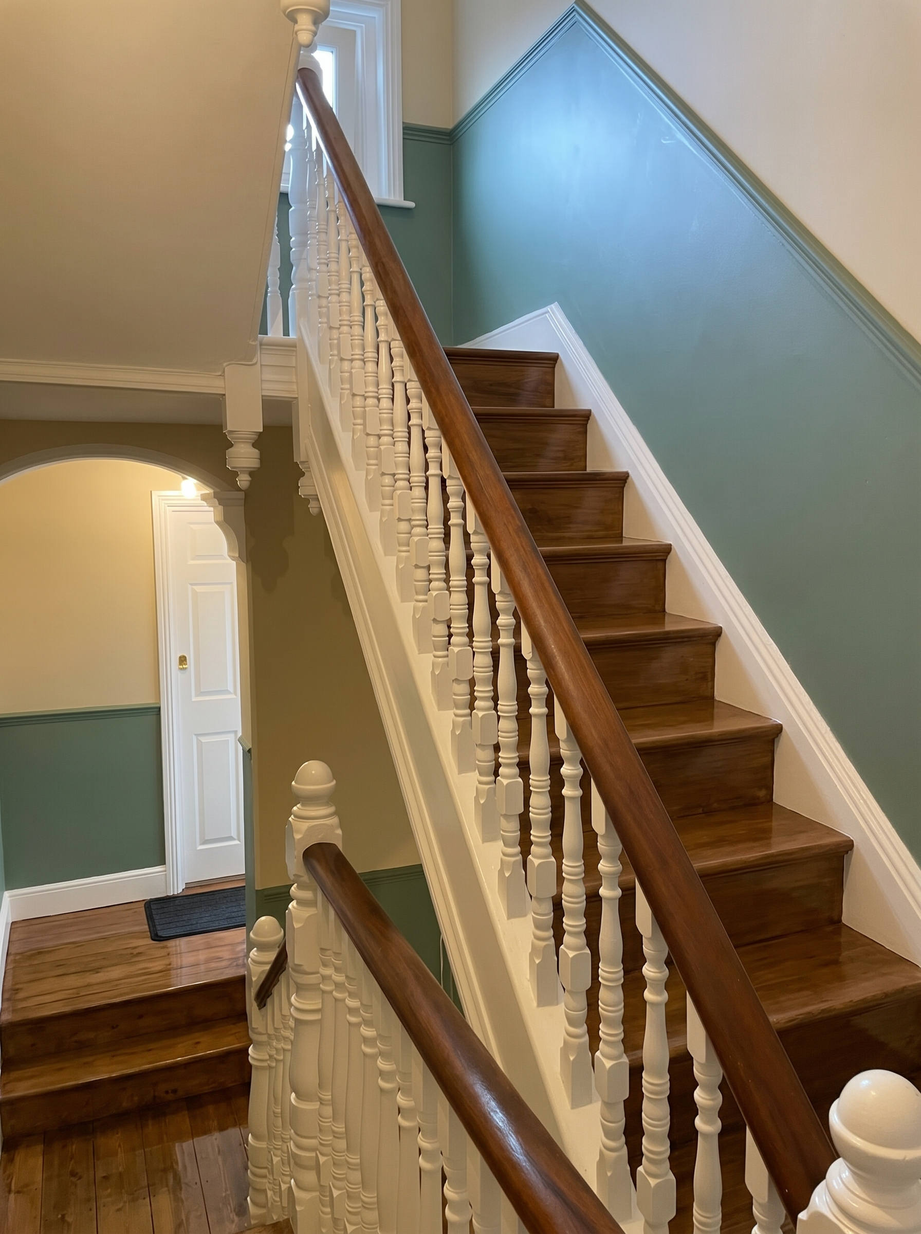 Residential hallway after painting and decorating improvements.
