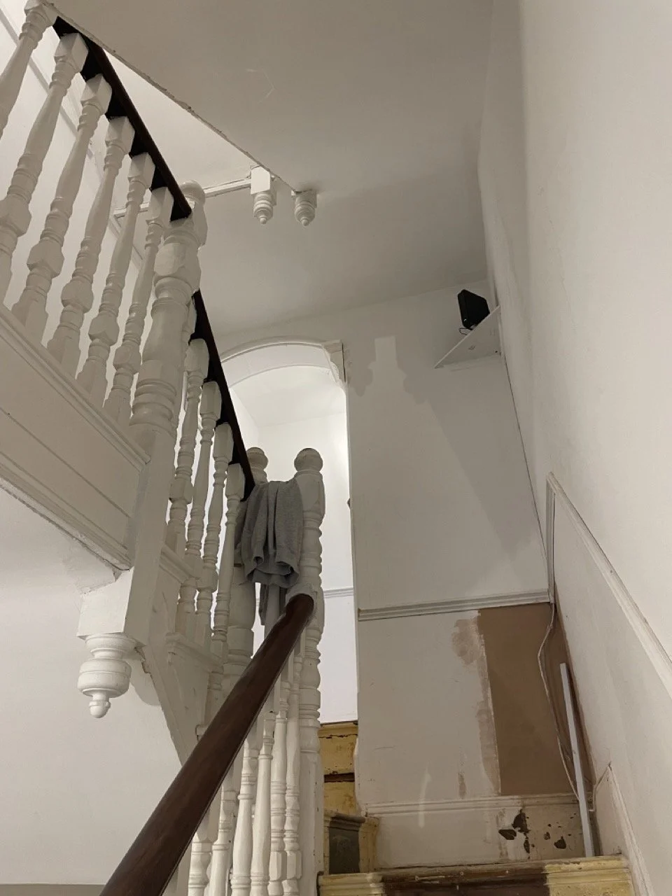 Staircase and hallway before interior decoration and restoration.