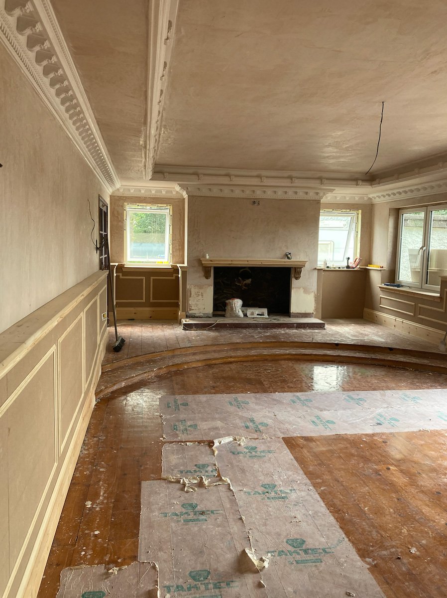 Living room before fireplace and interior decoration work.