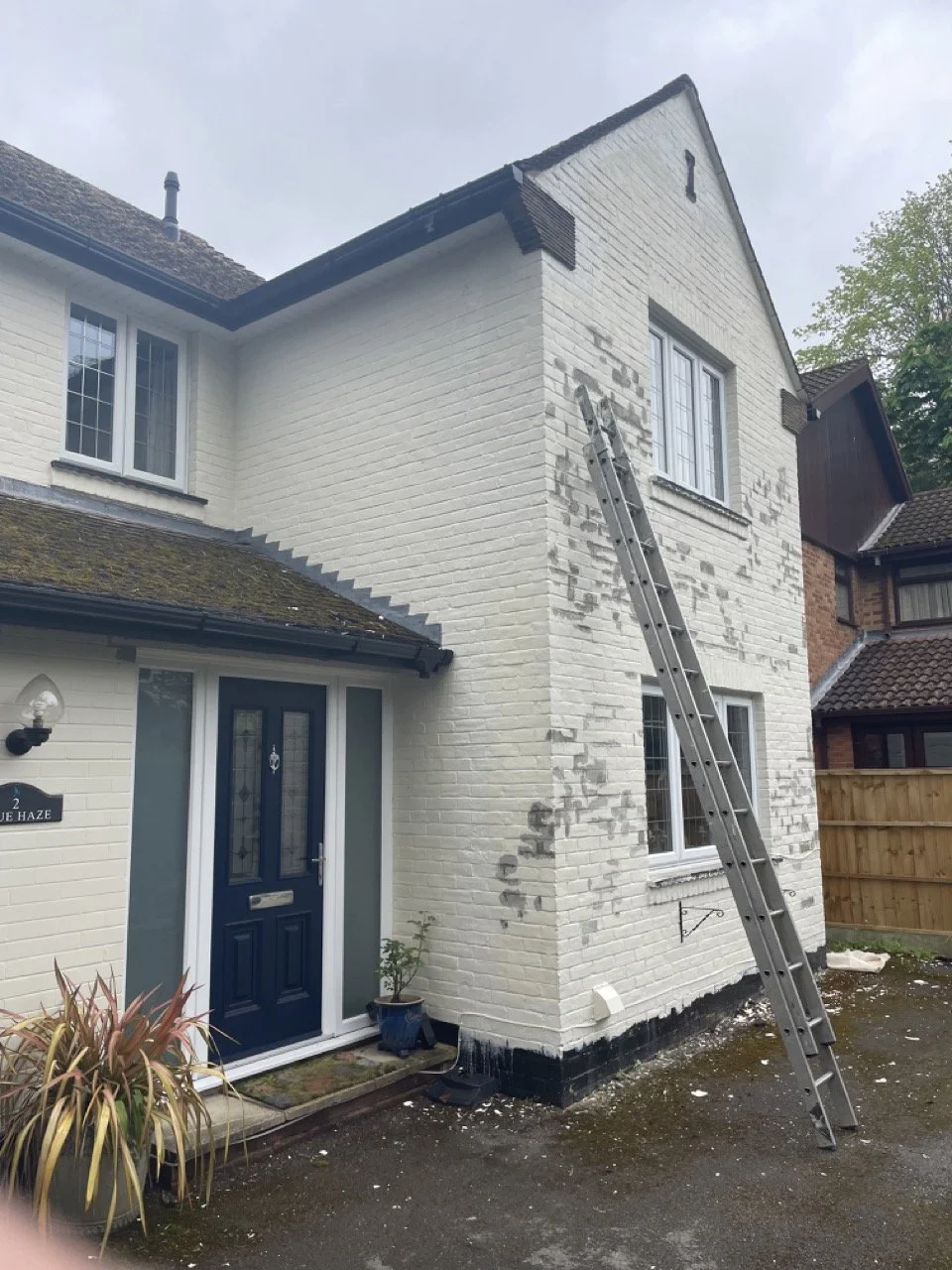 Exterior house painting in progress on a residential property in Southampton.