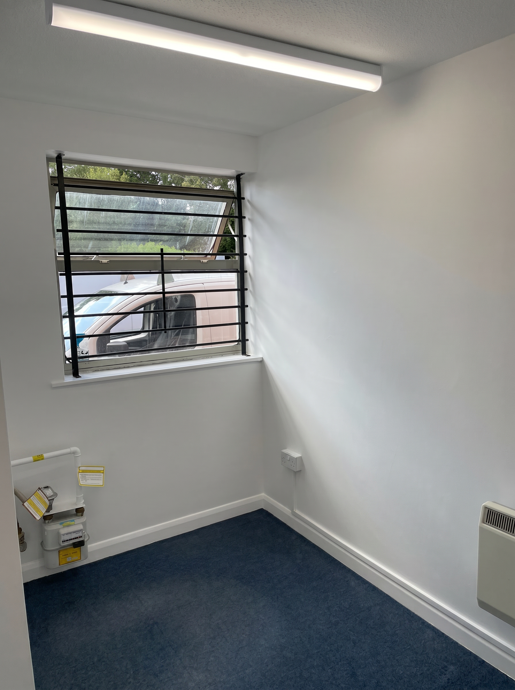 Interior room after restoration and protective painting measures for a clean and high quality finish.