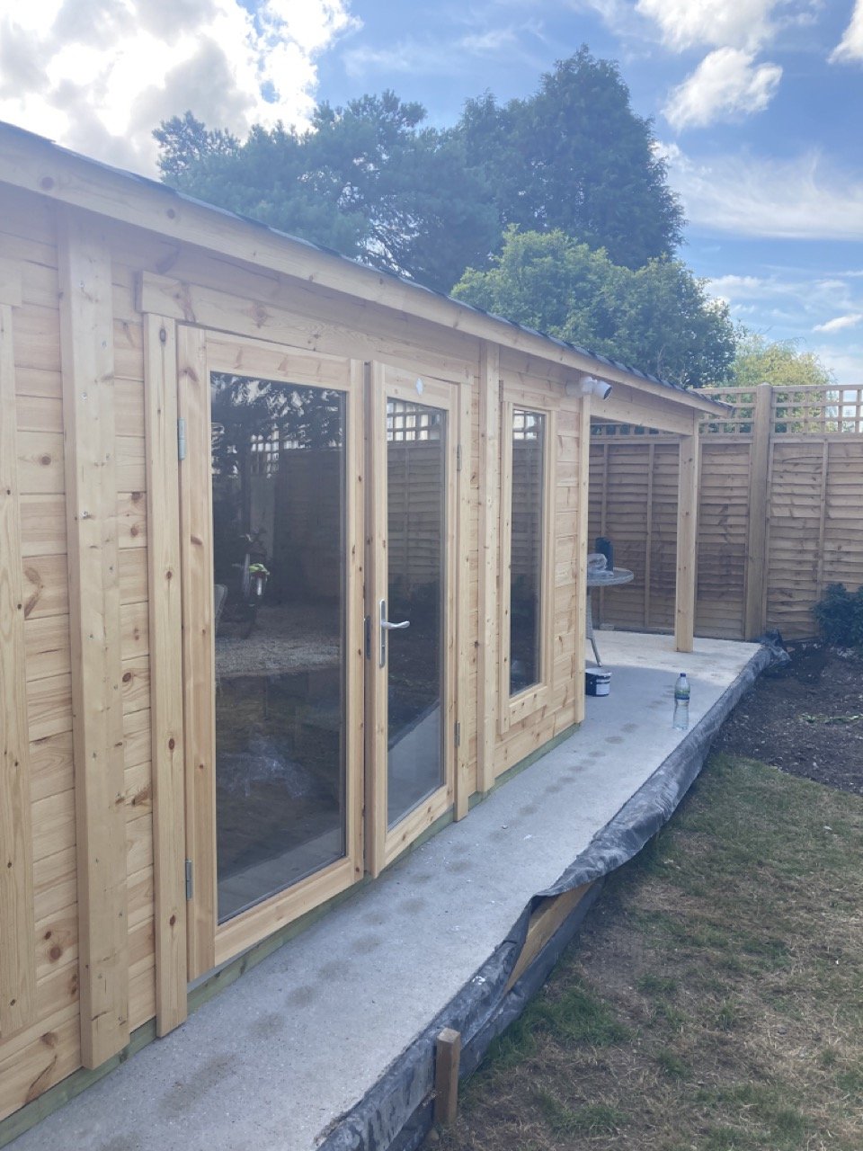 Garden outhouse exterior before final decoration and finishing work.
