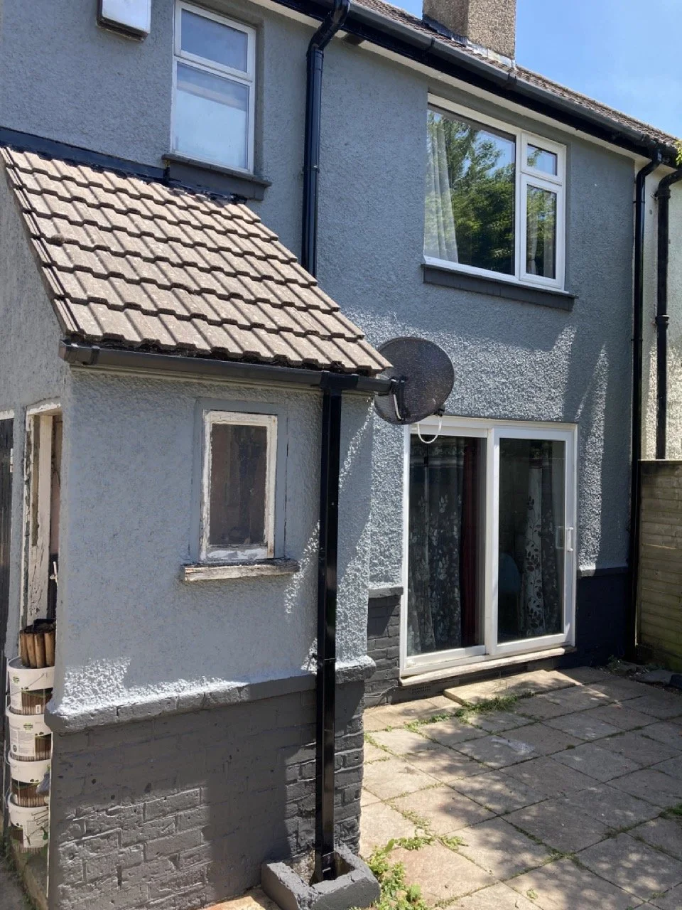 Garden facing exterior after full prep and decoration service, left clean and brightly restored.
