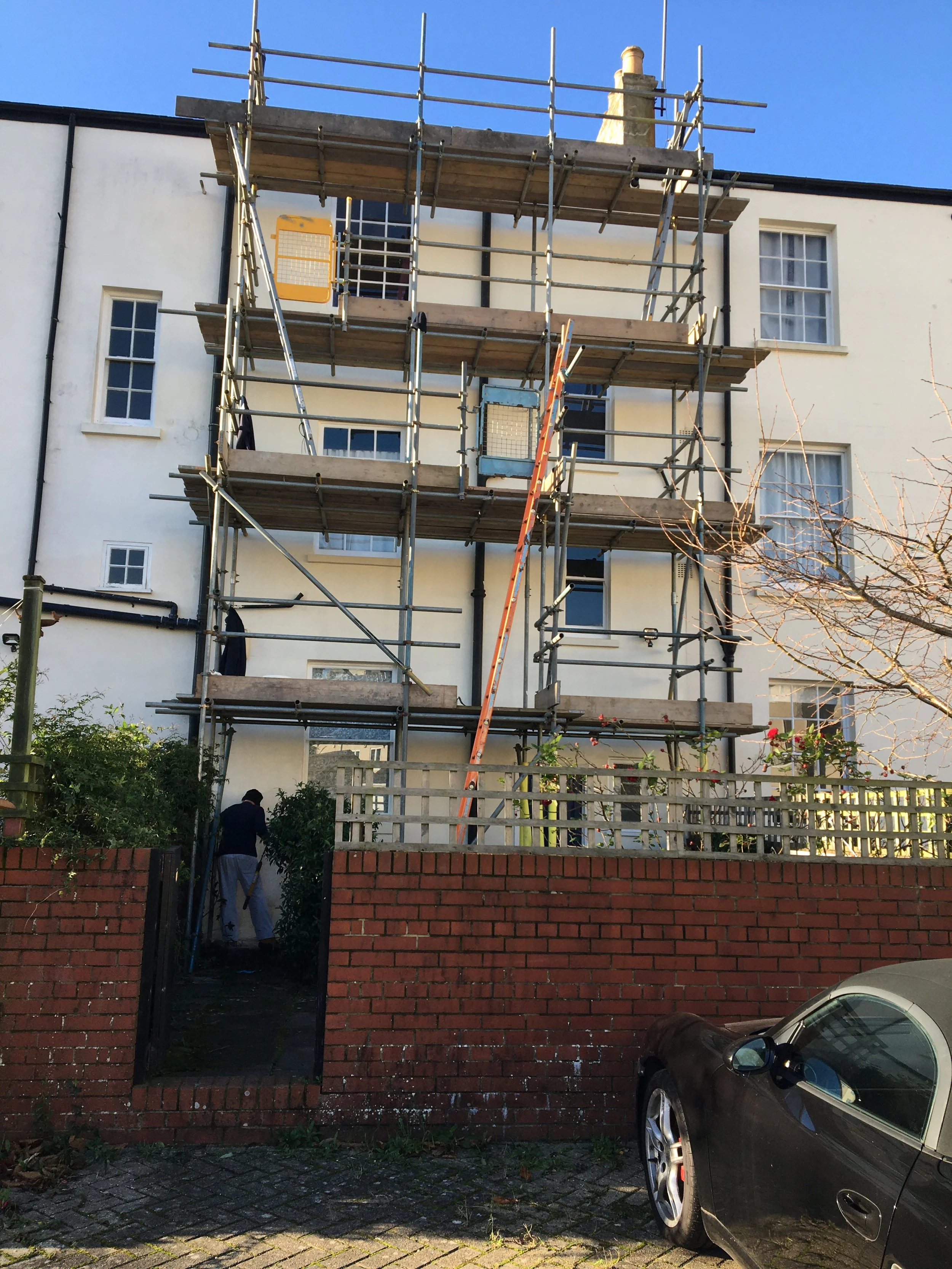 Domestic exterior before restoration work and repainting.