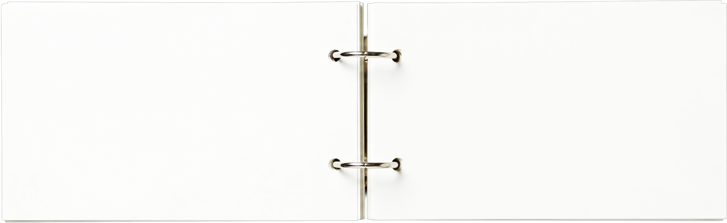 Open white binder with metal rings.