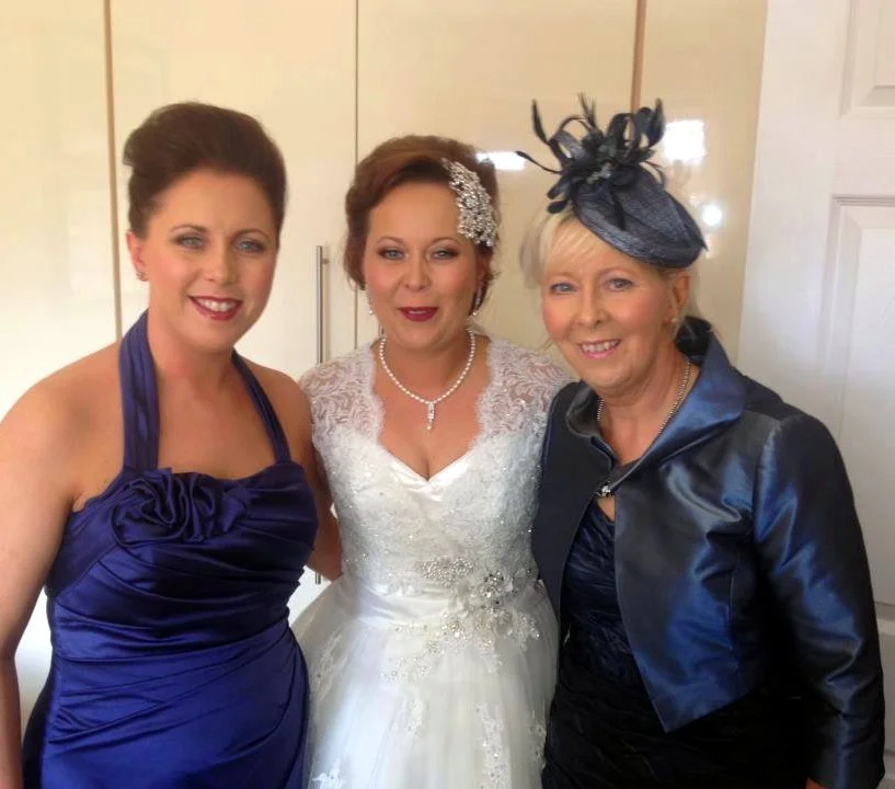 Mother of the Bride wearing John Paul Millinery