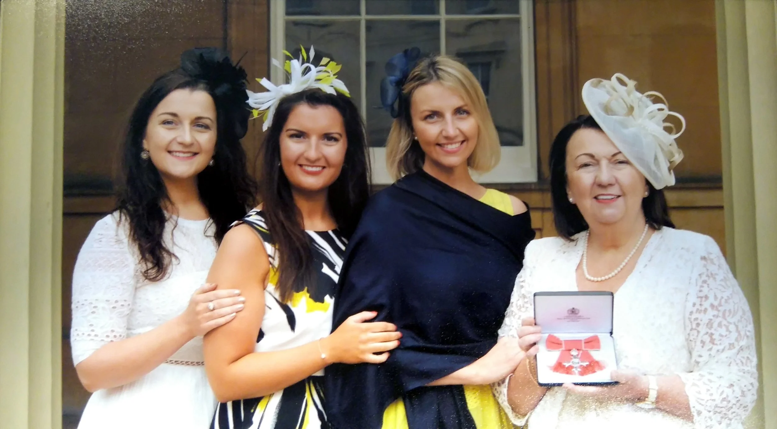 Investiture at Buckingham Palace - Sandra Biddle receiving her honour wearing John Paul Millinery 